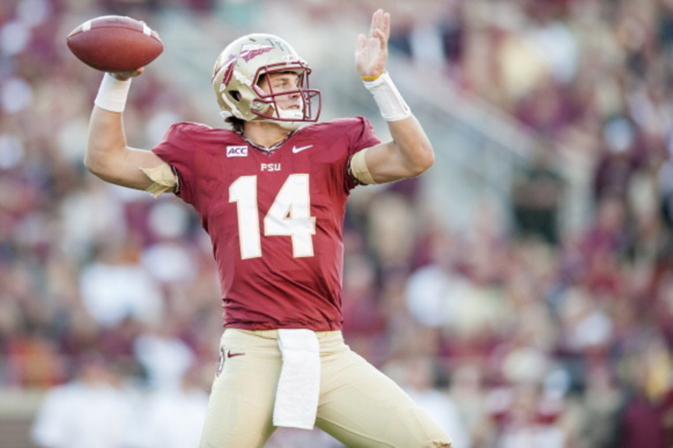 TALLAHASSEE, FL - OCTOBER 26: Jacob Coker #14 of the Florida State Seminoles winds up for a throw during the second half against the North Carolina State Wolfpack at Doak Campbell Stadiumon October 26, 2013 in Tallahassee, Florida. The Seminoles beat the 