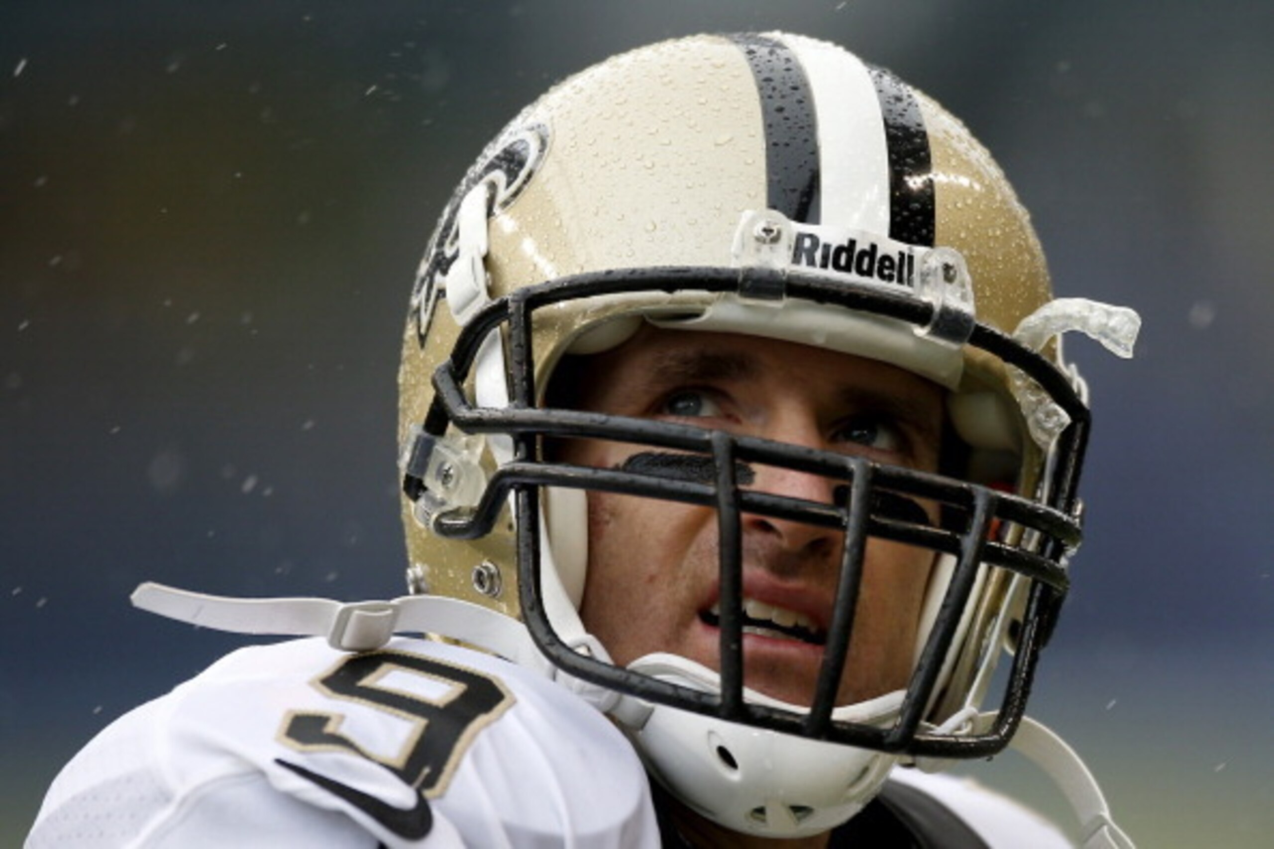 SEATTLE, WA - JANUARY 11:  Quarterback Drew Brees #9 of the New Orleans Saints reacts while taking on the Seattle Seahawks during the NFC Divisional Playoff Game at CenturyLink Field on January 11, 2014 in Seattle, Washington.  (Photo by Otto Greule Jr/Ge