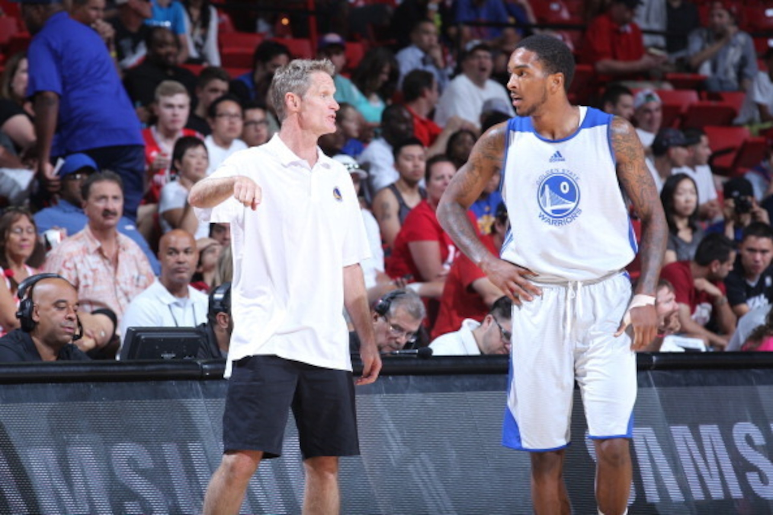 LAS VEGAS, NV - JULY 18: Steve Kerr of the Golden State Warriors talks with Davon Usher #0 during the game against the Milwaukee Bucks at the Samsung NBA Summer League 2014 on July 18, 2014 at the Thomas & Mack Center in Las Vegas, Nevada. NOTE TO USER: U