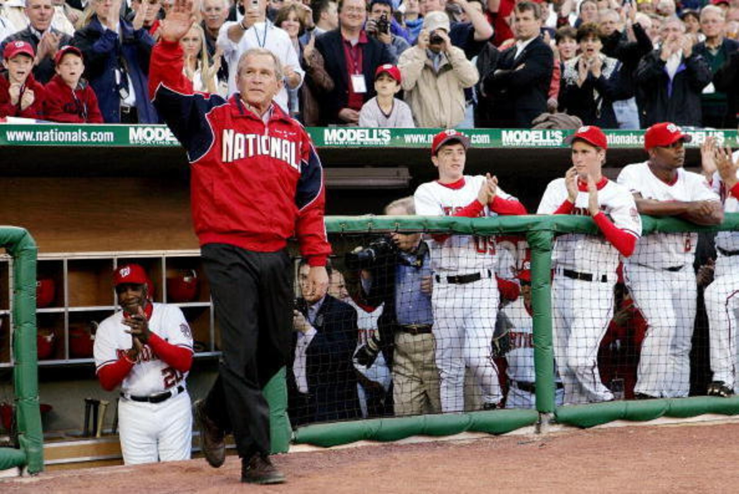 WASHINGTON - APRIL 14: (AFP OUT) U.S. President George W. Bush takes the field to throw out the first pitch for the Washington Nationals home opener against the Arizona Diamondbacks on April 14, 2005 at RFK Stadium in Washington, DC. The Nationals take th WASHINGTON - APRIL 14: (AFP OUT) U.S. President George W. Bush takes the field to throw out the first pitch for the Washington Nationals home opener against the Arizona Diamondbacks on April 14, 2005 at RFK Stadium in Washington, DC. The Nationals take th