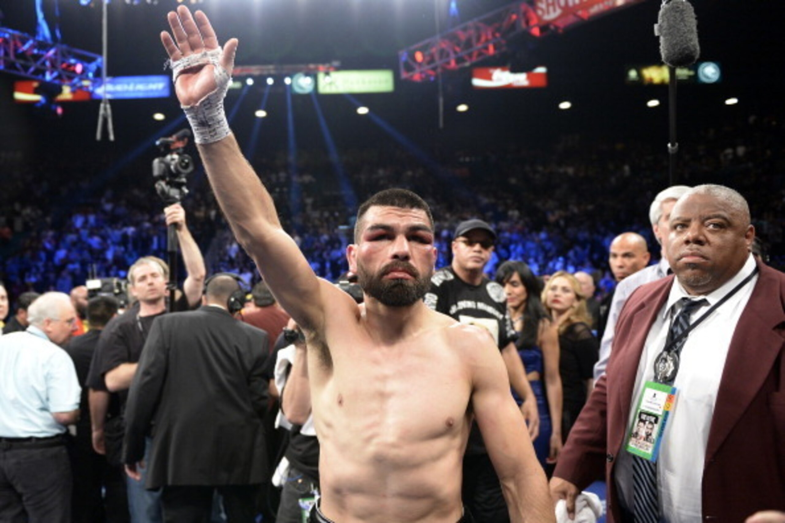 LAS VEGAS, NV - MARCH 8: Alfredo Angulo waves to fans as he leaves the ring after referee Tony Weeks stopped the fight in the 10th round during the non-title, 12-round super welterweight bout against Canelo Alvarez at the MGM Grand Garden March 8, 2014, i