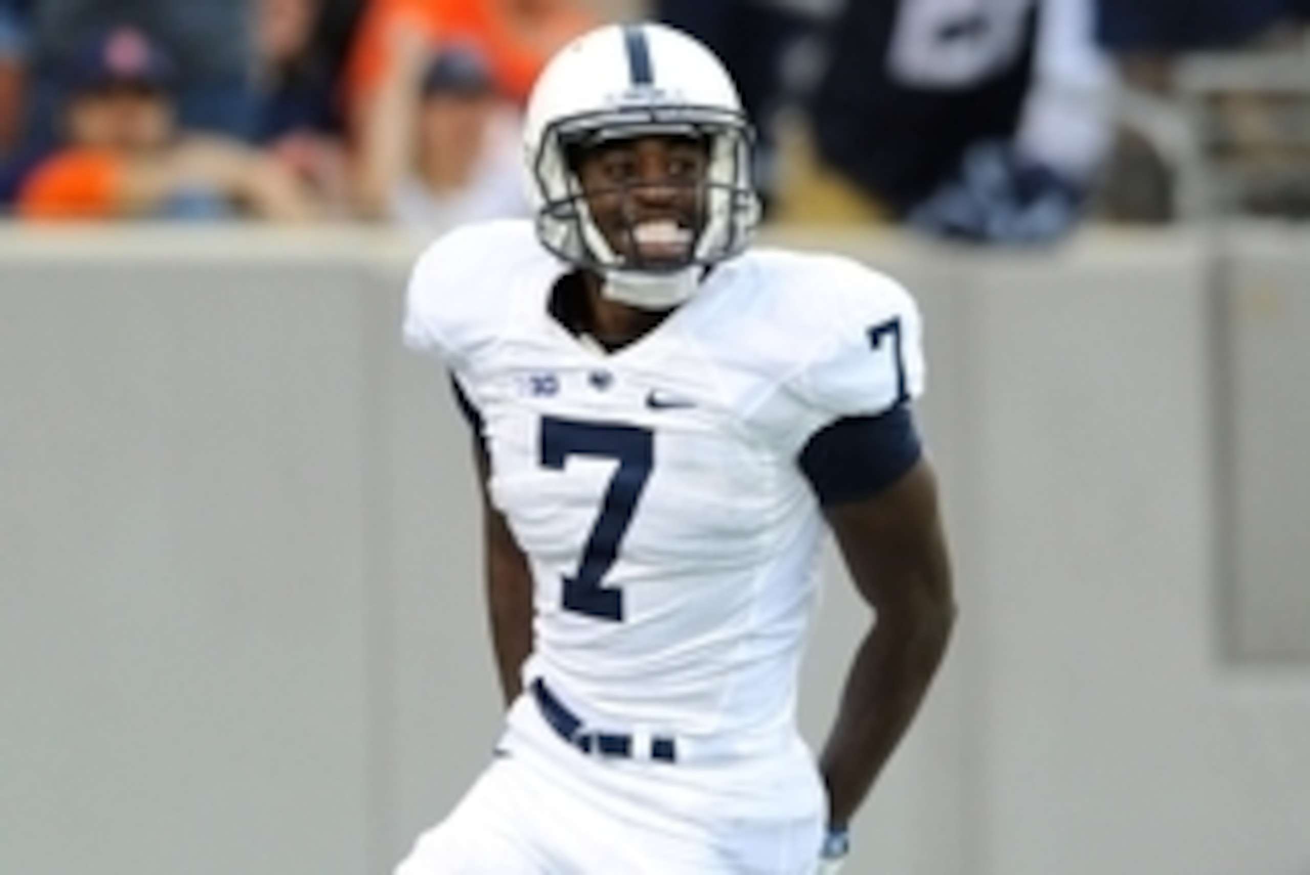 Aug 31, 2013; East Rutherford, NJ, USA; Penn State Nittany Lions wide receiver Geno Lewis (7) reacts after scoring a touchdown during the third quarter against the Syracuse Orange at MetLife Stadium.  Penn State defeated Syracuse 23-17.  Mandatory Credit: