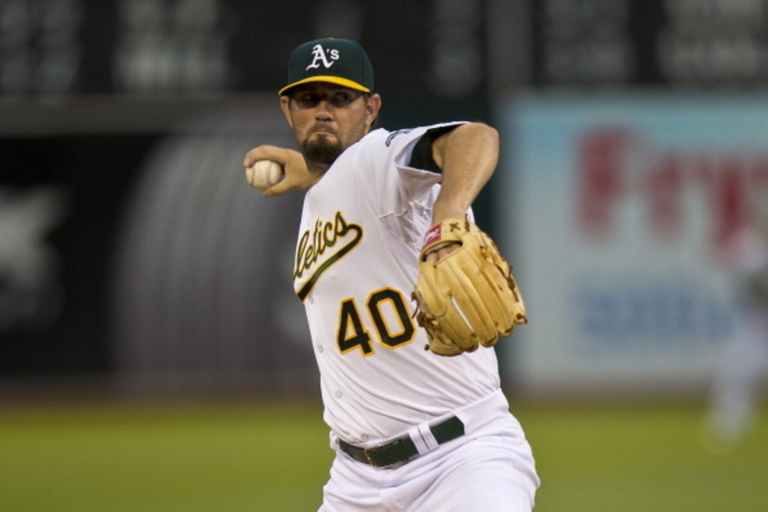 OAKLAND, CA - AUGUST 05:  Jason Hammel #40 of the Oakland Athletics pitches against the Tampa Bay Rays during the first inning at O.co Coliseum on August 5, 2014 in Oakland, California. (Photo by Jason O. Watson/Getty Images)