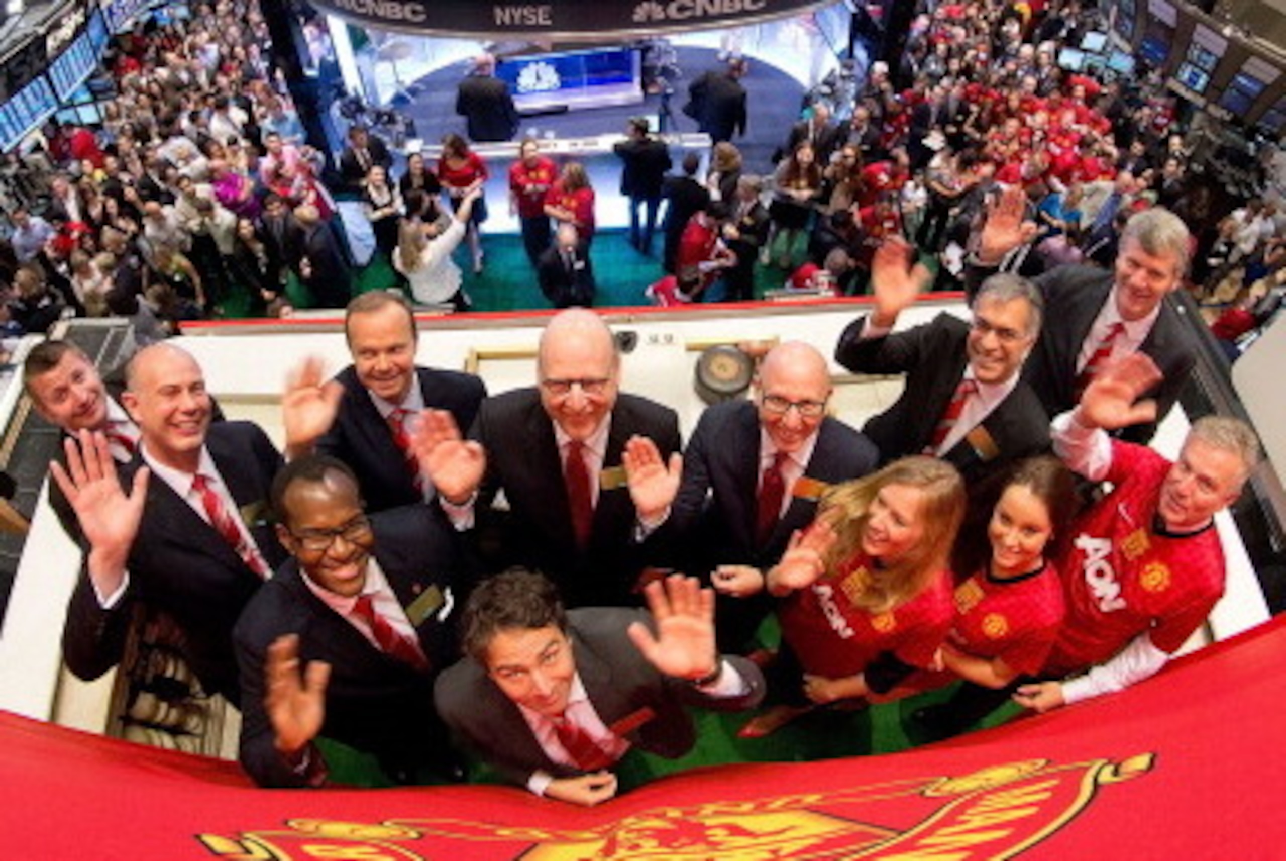 NEW YORK, NY - AUGUST 10:  In this handout photo provided by the NYSE Euronext, Manchester United Executives David Gill (R), Joel Glazer (C, R) and Avram Glazer (C) with Ed Woodward prepare to ring the Opening Bell at the New York Stock Exchange on August