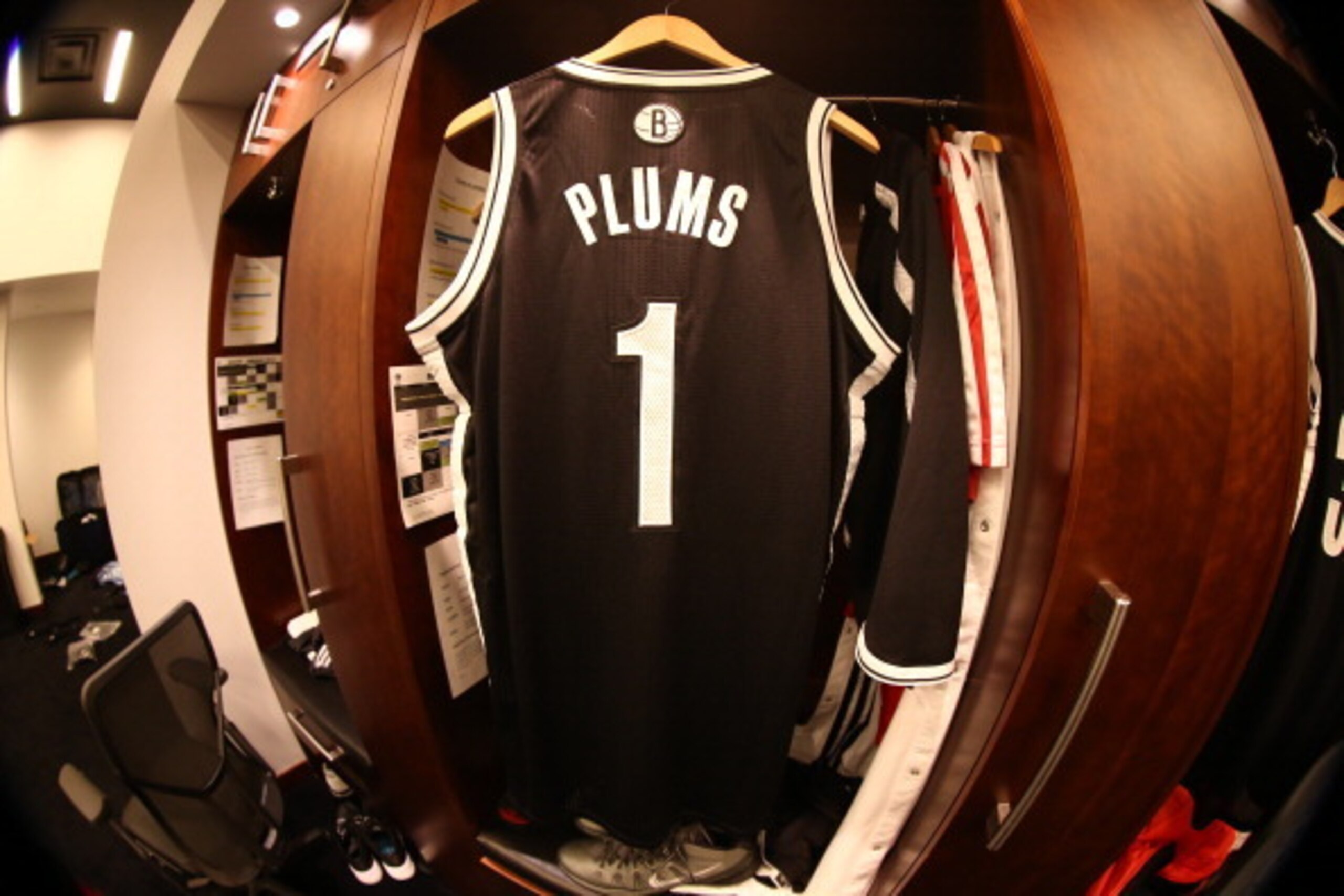 NEW YORK, NY - JANUARY 10:  Mason Plumlee #1 of the Brooklyn Nets jersey hangs in his locker prior to a game at the Barclays Center on January 10, 2014 in the Brooklyn borough of New York City.  NOTE TO USER: User expressly acknowledges and agrees that, b