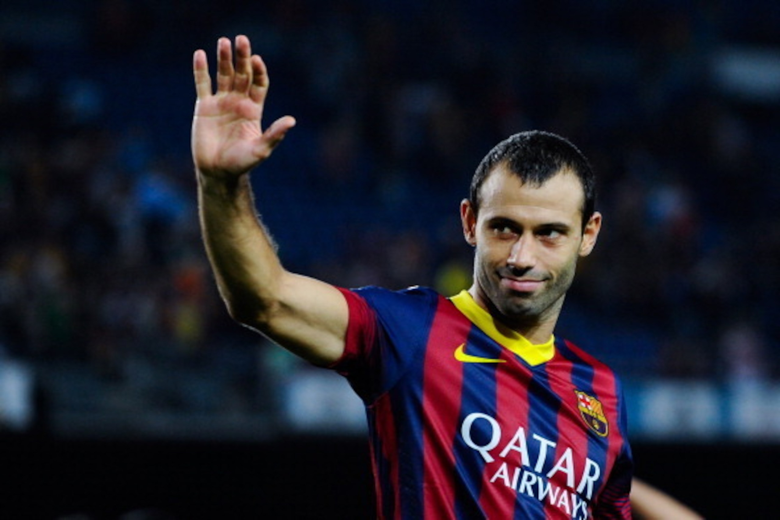 BARCELONA, SPAIN - AUGUST 28:  Javier Mascherano of FC Barcelona celebrates after winning the Spanish Super Cup during the Spanish Super Cup second leg match between FC Barcelona and Atletico de Madrid at Nou Camp on August 28, 2013 in Barcelona, Spain.  