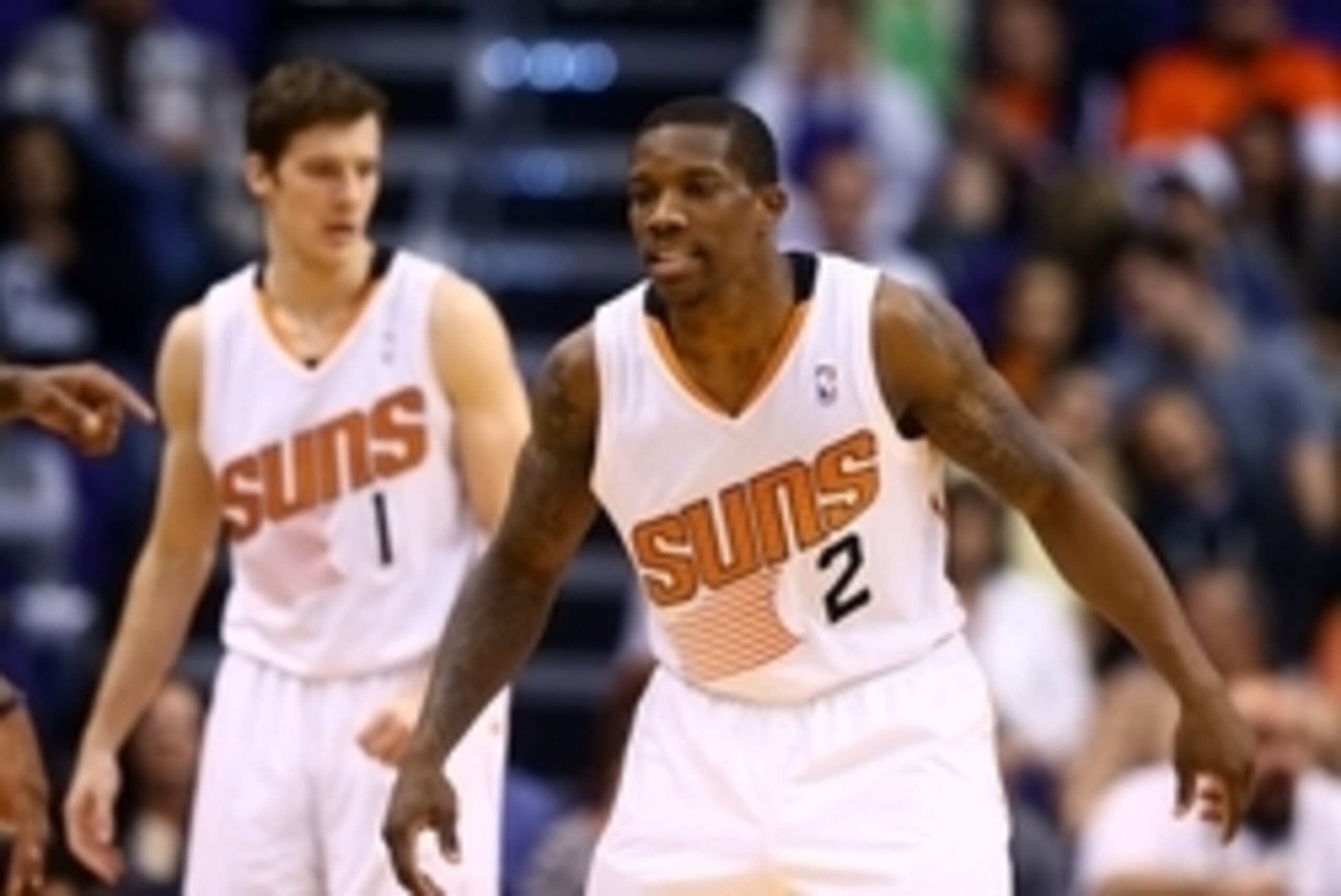 Dec 13, 2013; Phoenix, AZ, USA; Phoenix Suns guard Eric Bledsoe (2) and Goran Dragic against the Sacramento Kings at US Airways Center. The Suns defeated the Kings 116-107. Mandatory Credit: Mark J. Rebilas-USA TODAY Sports