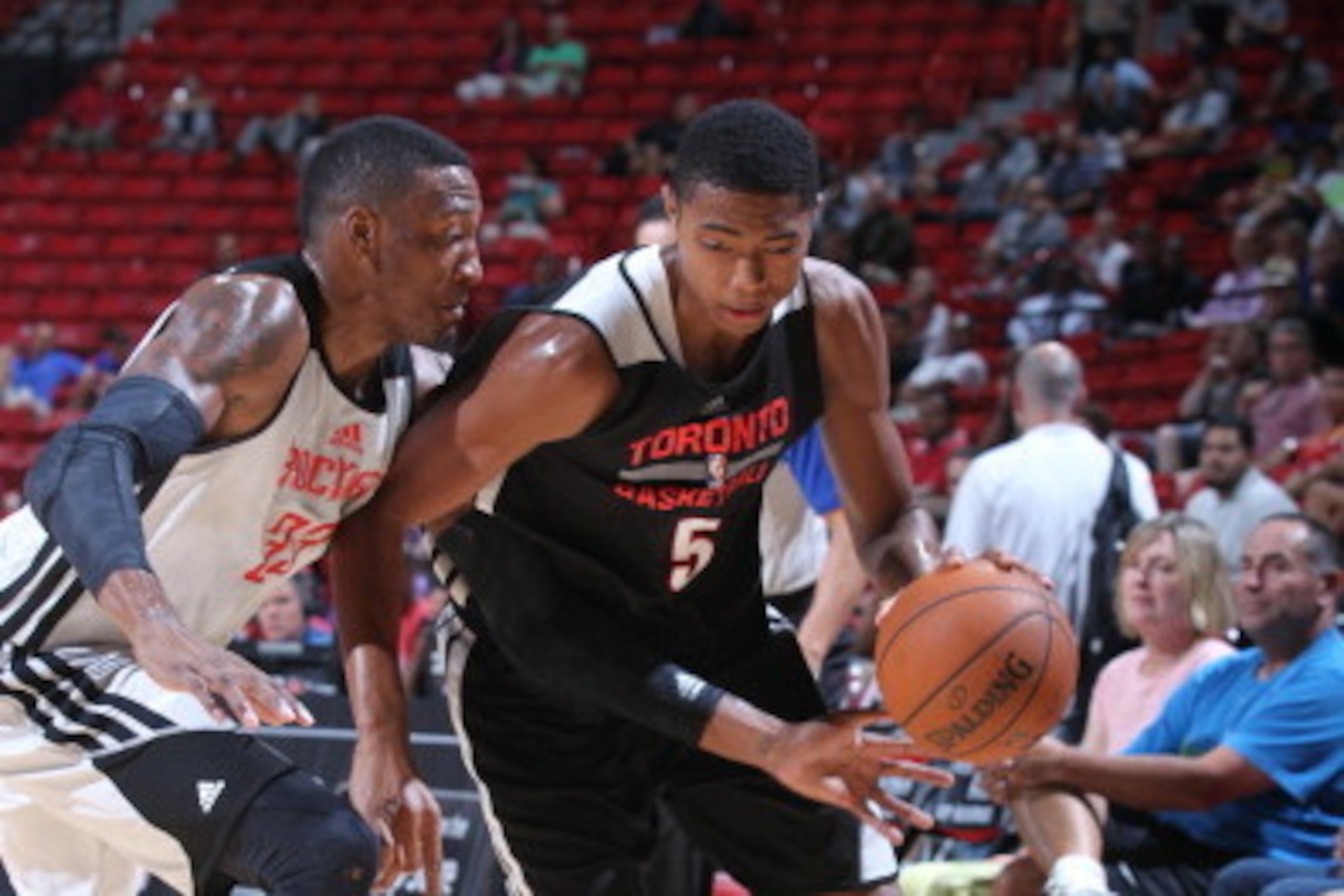 LAS VEGAS, NV - JULY 16:  Bruno Caboclo #5 of the Toronto Raptors handles the ball against the Houston Rockets on July 16, 2014 at the Thomas & Mack Center in Las Vegas, Nevada. NOTE TO USER: User expressly acknowledges and agrees that, by downloading and