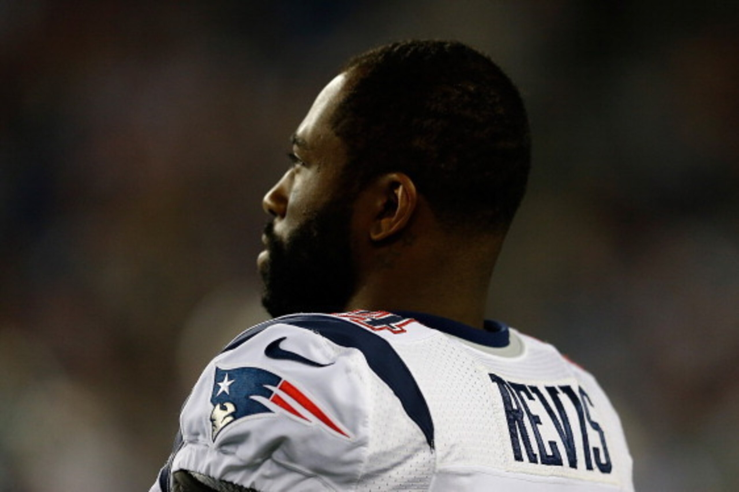FOXBORO, MA - AUGUST 15: Darrelle Revis #24 of the New England Patriots watches the action from the sideline during a pre-season game with the Philadelphia Eagles at Gillette Stadium on August 15, 2014 in Foxboro, Massachusetts. (Photo by Jim Rogash/Getty