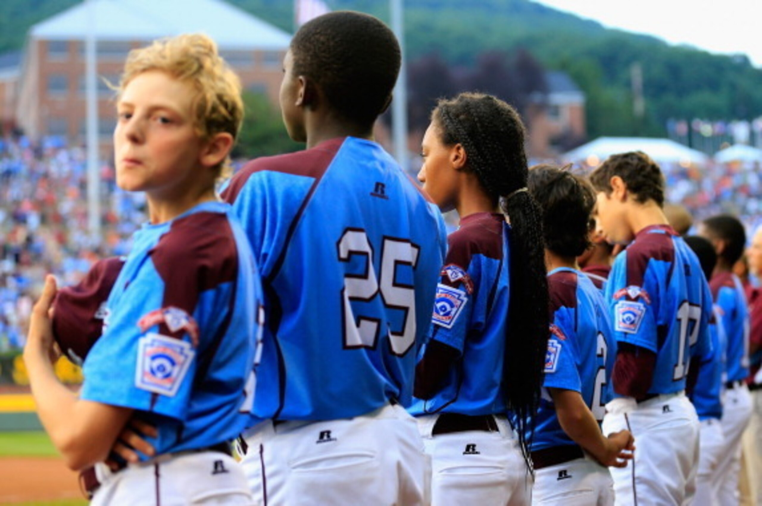 SOUTH WILLIAMSPORT, PA - AUGUST 20: Members of the Pennsylvania team listen to the national anthem against Nevada during their 8-1 loss during the United States division game at the Little League World Series tournament at Lamade Stadium on August 20, 20 SOUTH WILLIAMSPORT, PA - AUGUST 20: Members of the Pennsylvania team listen to the national anthem against Nevada during their 8-1 loss during the United States division game at the Little League World Series tournament at Lamade Stadium on August 20, 20