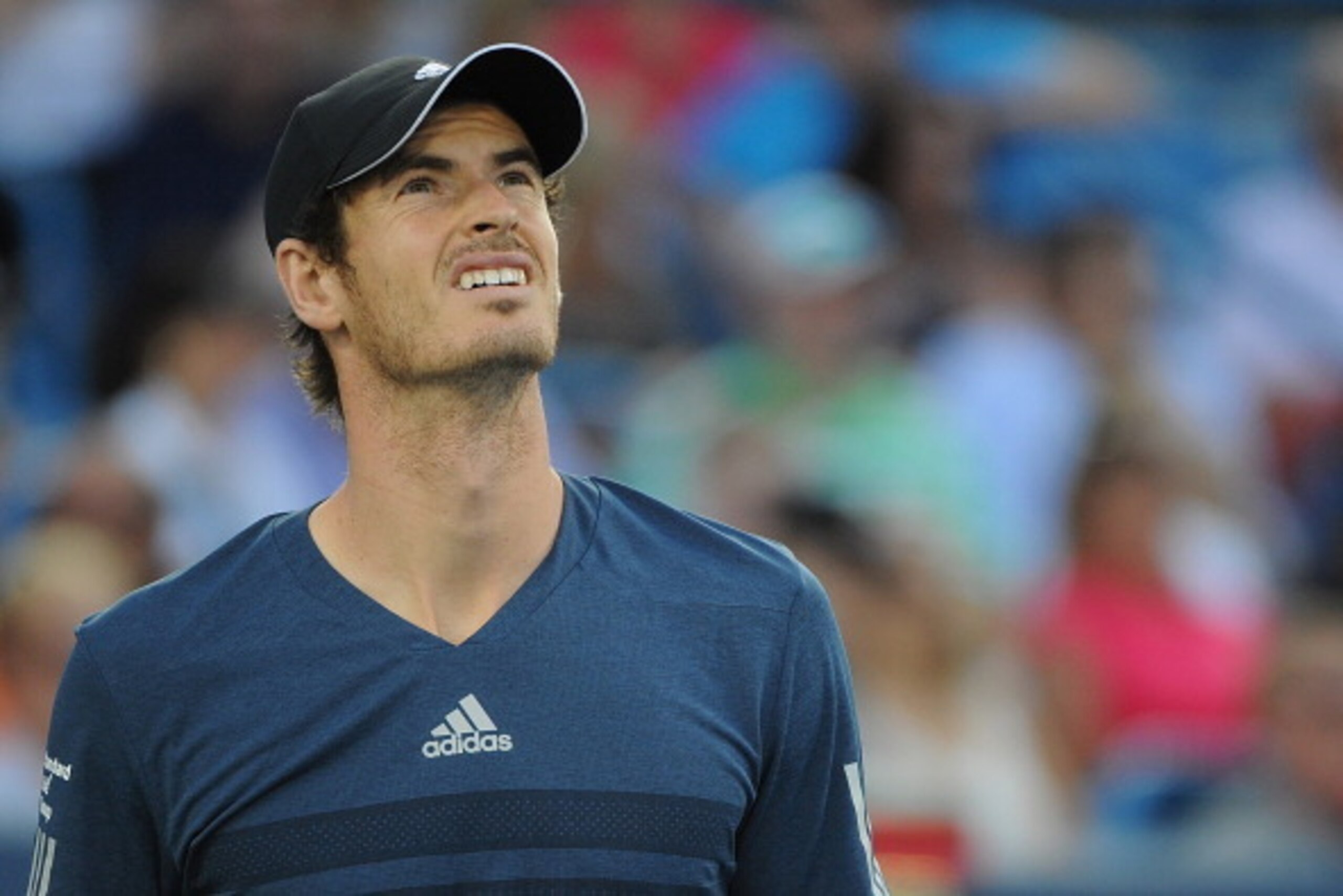 CINCINNATI, OH - AUGUST 15:  Andy Murray of Great Britian reacts during a match against Roger Federer of Switzerland on day 7 of the Western & Southern Open at the Linder Family Center on August 15, 2014 in Cincinnati, Ohio.  (Photo by Jonathan Moore/Gett