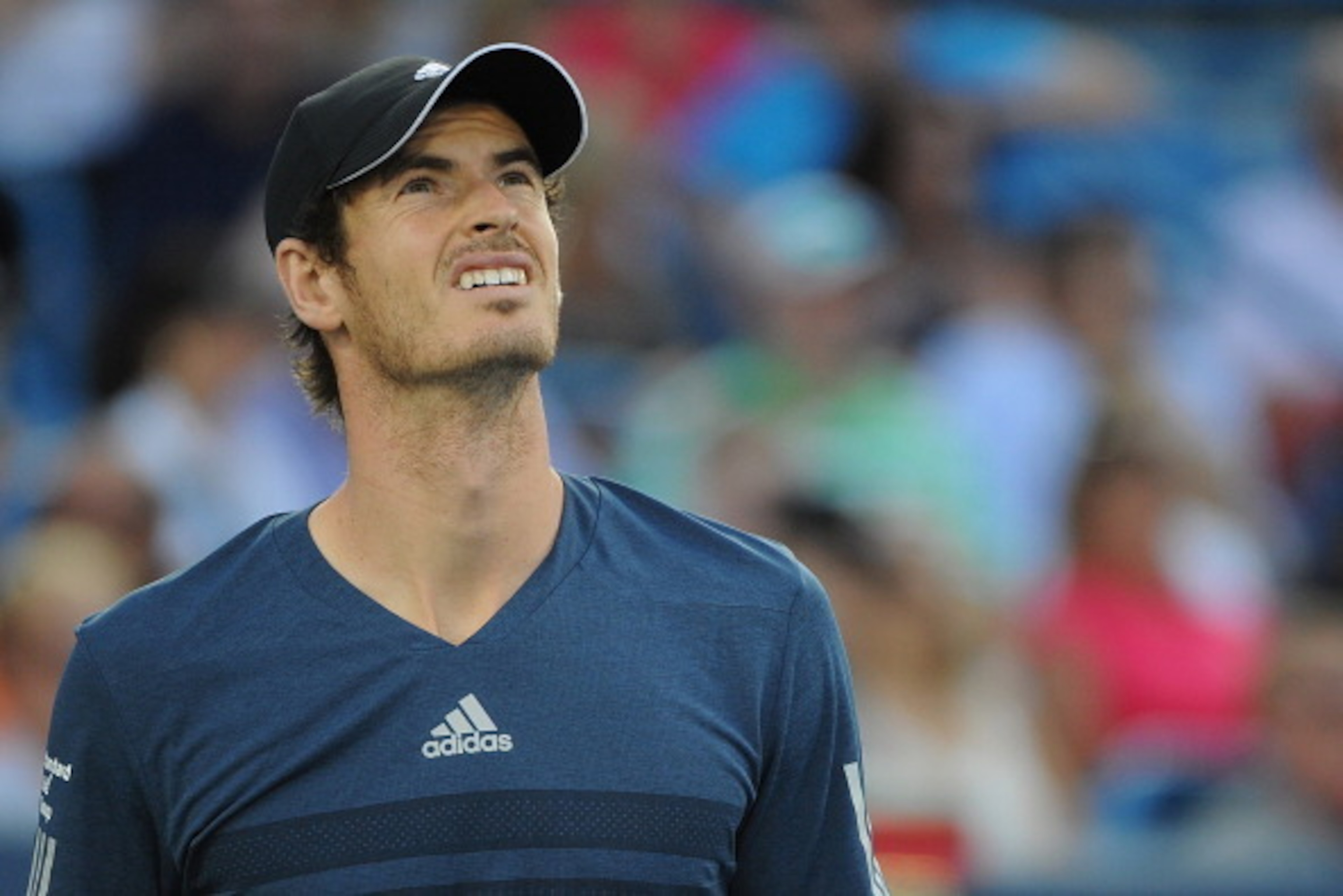 CINCINNATI, OH - AUGUST 15:  Andy Murray of Great Britian reacts during a match against Roger Federer of Switzerland on day 7 of the Western & Southern Open at the Linder Family Center on August 15, 2014 in Cincinnati, Ohio.  (Photo by Jonathan Moore/Gett