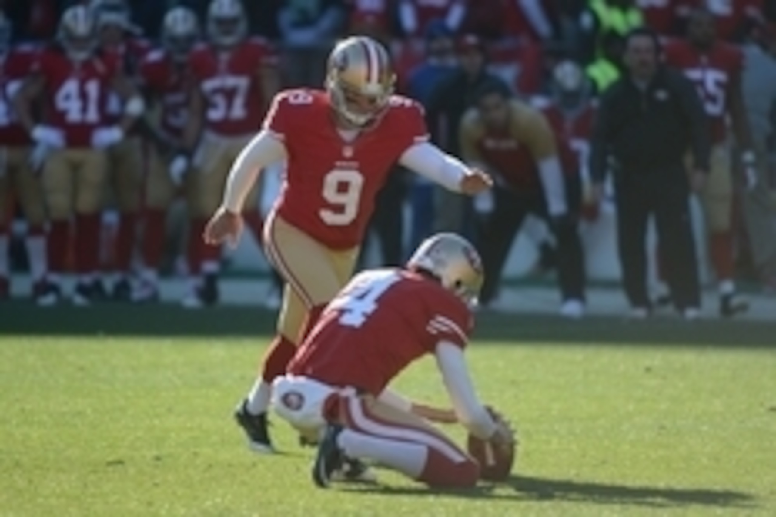 December 8, 2013; San Francisco, CA, USA; San Francisco 49ers kicker Phil Dawson (9) kicks a field goal out of the hold by punter Andy Lee (4) during the second quarter against the Seattle Seahawks at Candlestick Park. The 49ers defeated the Seahawks 19-1