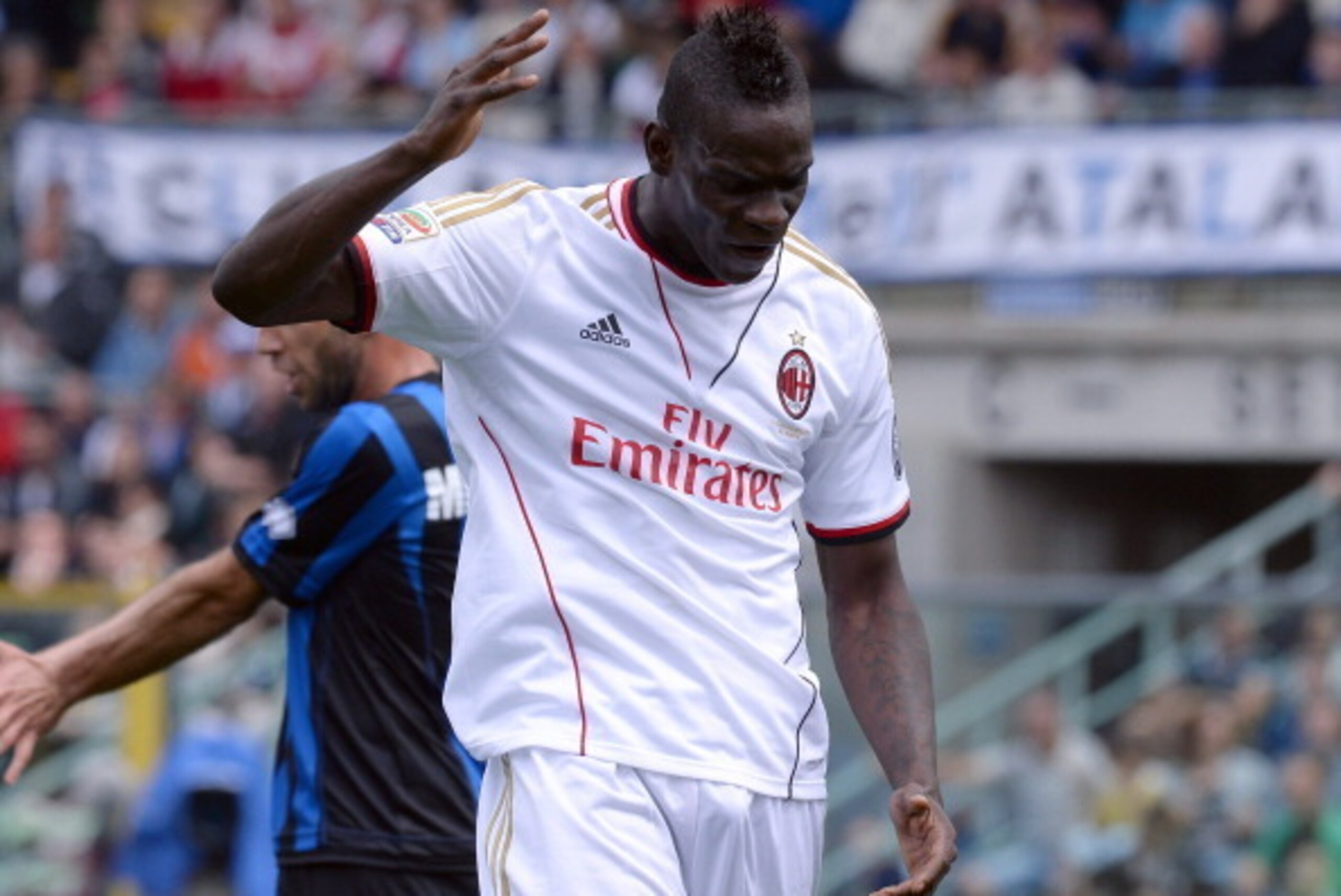 BERGAMO, ITALY - MAY 11:  Mario Balotelli of AC Milan shows his dejection during the Serie A match between Atalanta BC and AC Milan at Stadio Atleti Azzurri d'Italia on May 11, 2014 in Bergamo, Italy.  (Photo by Claudio Villa/Getty Images)