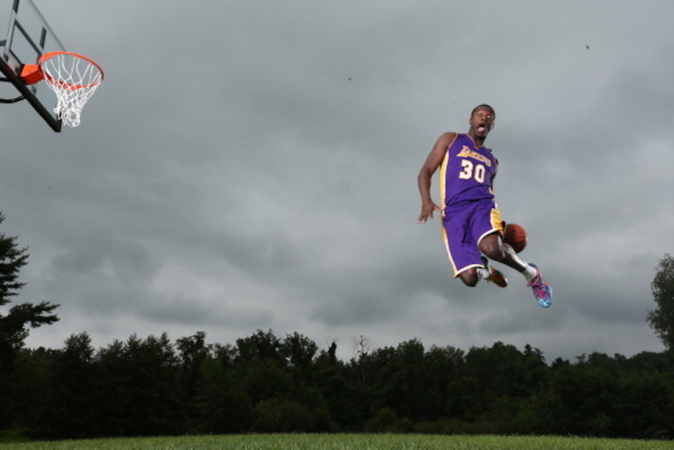 TARRYTOWN, NY - AUGUST 3: Julius Randle #30 of the Los Angeles Lakers poses for a portrait during the 2014 NBA rookie photo shoot on August 3, 2014 at the Madison Square Garden Training Facility in Tarrytown, New York. NOTE TO USER: User expressly acknowl