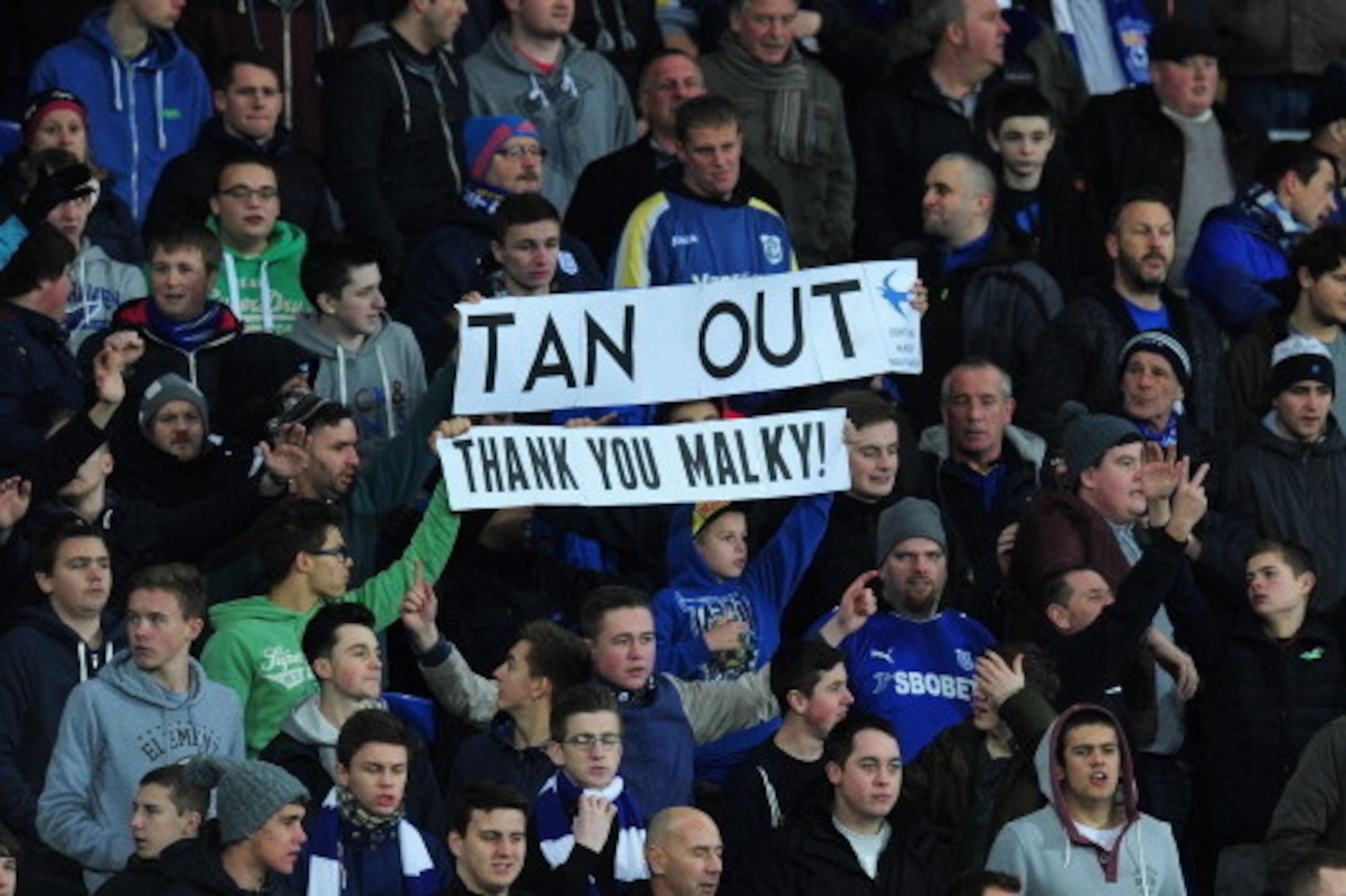 CARDIFF, WALES - DECEMBER 28: Cardiff fans show their support for former manager Malky MacKay during the Barclays Premier League match between Cardiff City and Sunderland at Cardiff City Stadium on December 28, 2013 in Cardiff, Wales. (Photo by Stu Fors CARDIFF, WALES - DECEMBER 28: Cardiff fans show their support for former manager Malky MacKay during the Barclays Premier League match between Cardiff City and Sunderland at Cardiff City Stadium on December 28, 2013 in Cardiff, Wales. (Photo by Stu Fors