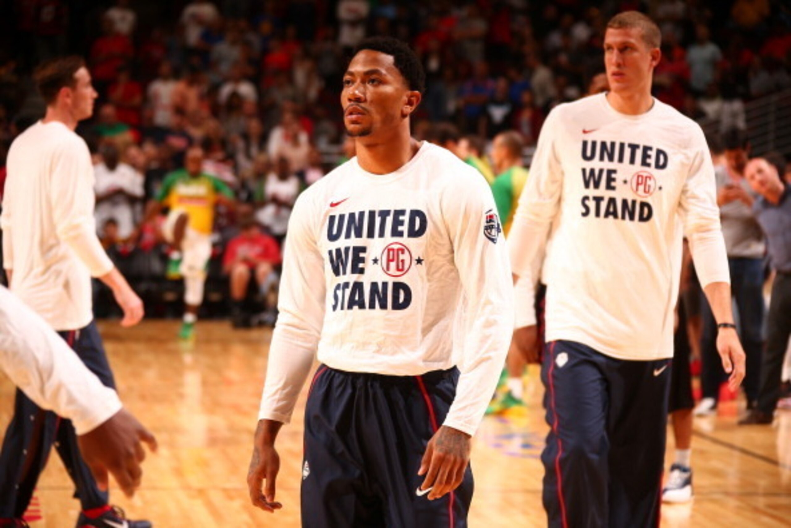 CHICAGO, IL - AUGUST 16: Derrick Rose #6 of the USA Basketball Men's National Team wears a shirt to support Paul George prior to playing in a game against the Brazil Basketball Men's National Team on August 16, 2014 at the United Center in Chicago, Illino
