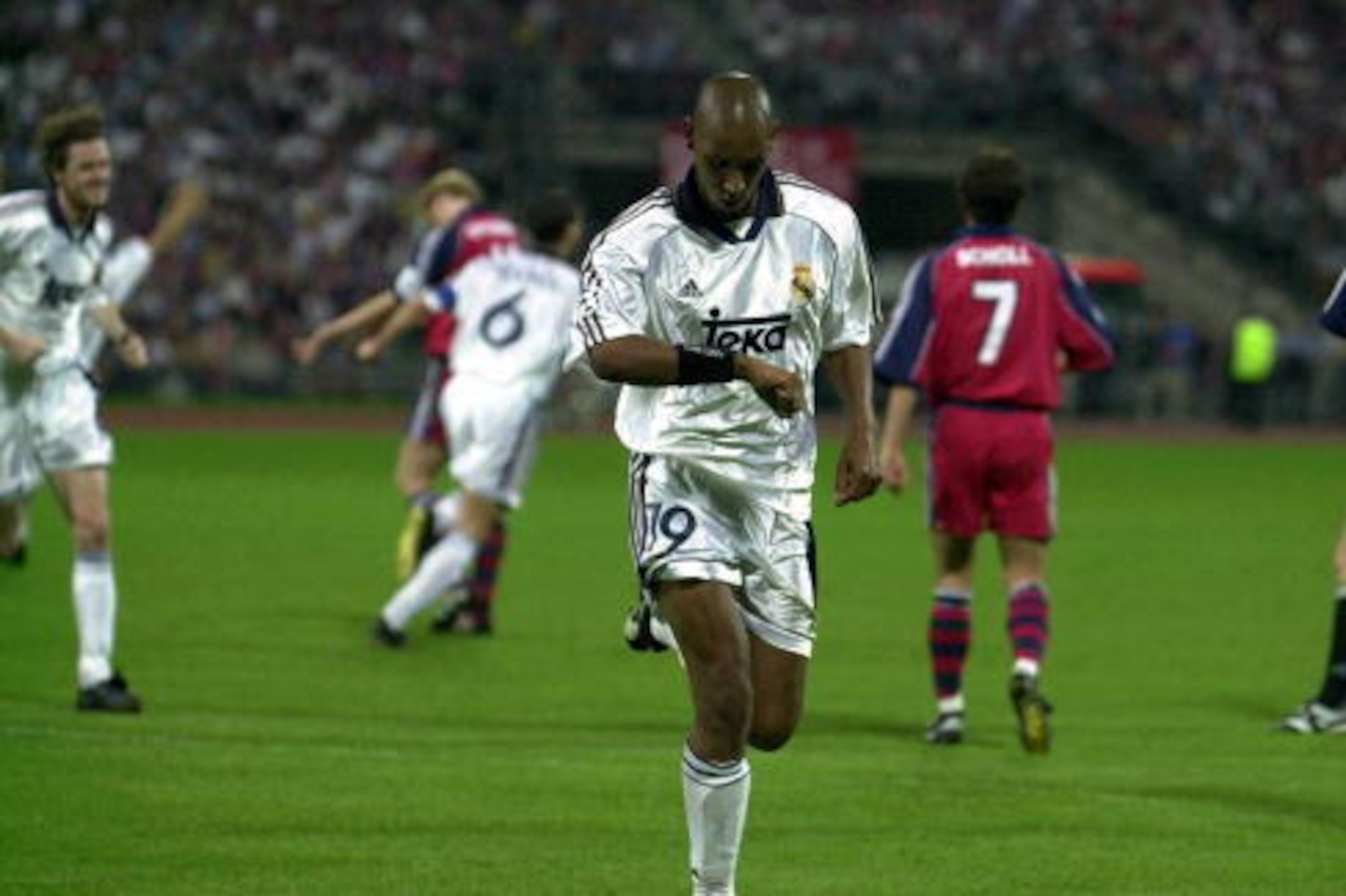 9 May 2000:  Nicolas Anelka of Real Madrid celebrates after scoring the vital away goal during the Bayern Munich v Real Madrid Champions League Semi-Final second legat the Olympic Stadium, Munich, Germany. Mandatory Credit: Ross Kinnaird/ALLSPORT