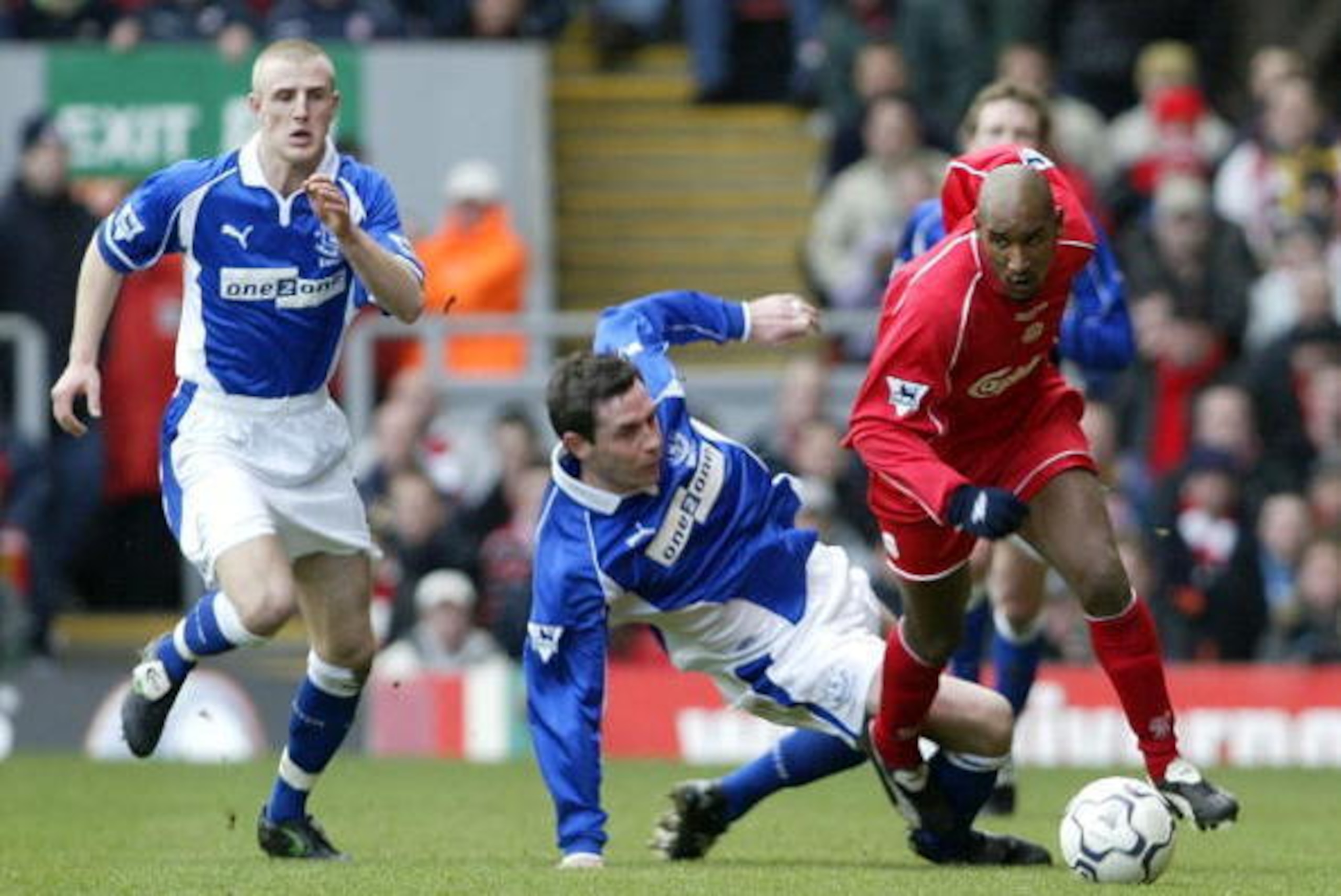 23 Feb 2002:  Nicolas Anelka of Liverpool gets past  David Weir of Everton during the Liverpool v Everton FA Barclaycard Premiership match at Anfield, Liverpool. DIGITAL IMAGE Mandatory Credit: Laurence Griffiths/Getty Images
