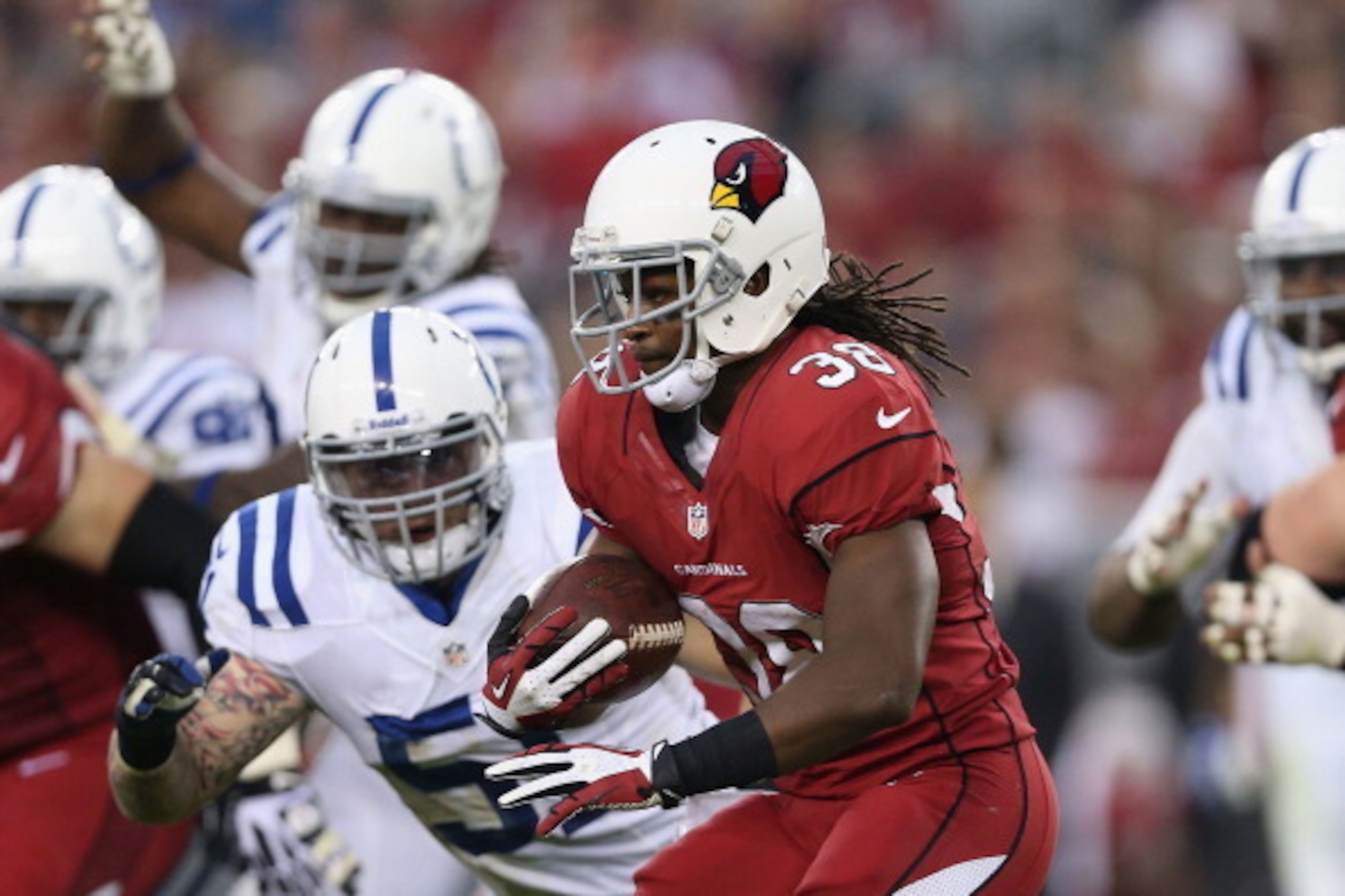 GLENDALE, AZ - NOVEMBER 24:  Running back Andre Ellington #38 of the Arizona Cardinals rushes the football against the Indianapolis Colts during the NFL game at the University of Phoenix Stadium on November 24, 2013 in Glendale, Arizona. The Cardinals def