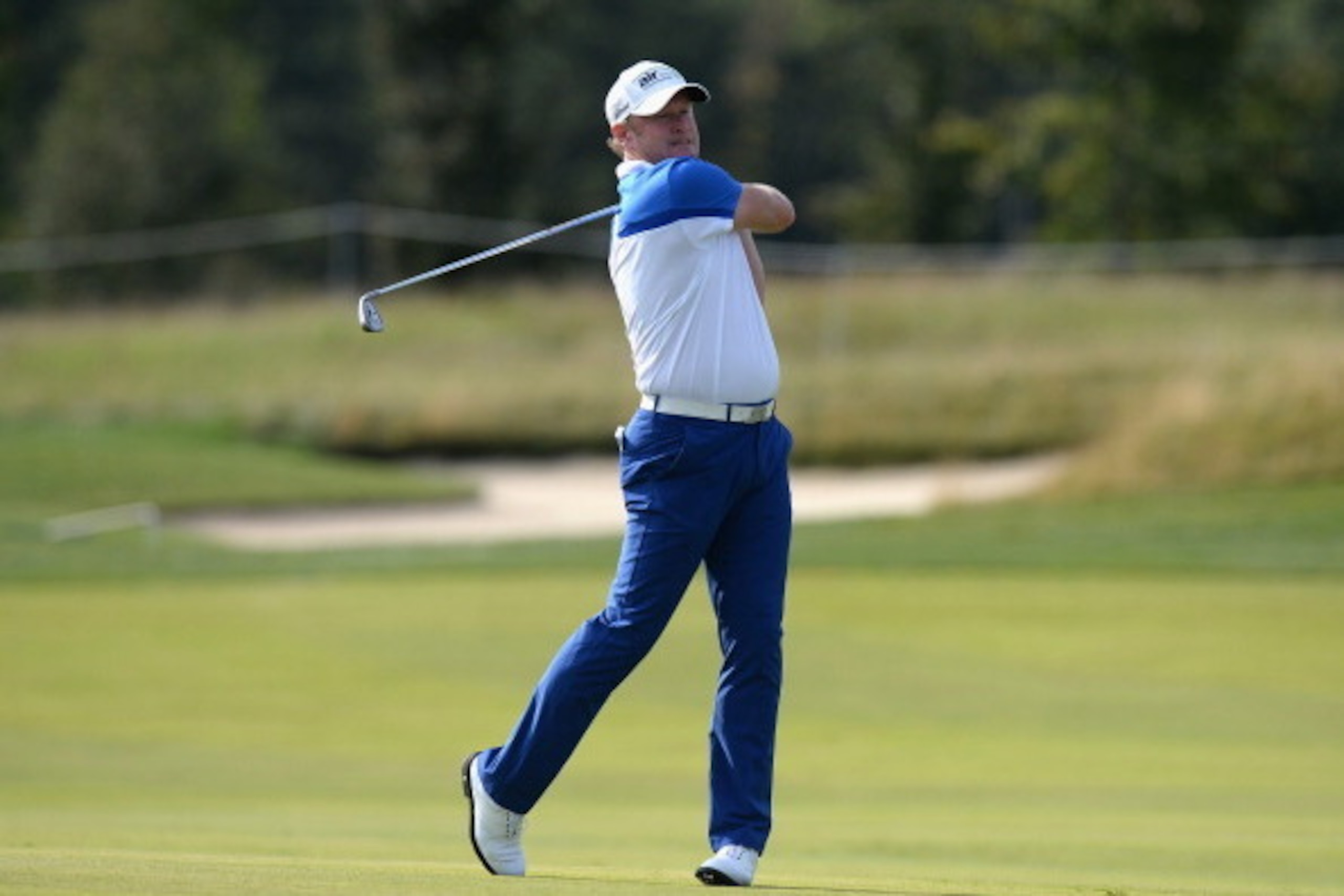 PRAGUE, CZECH REPUBLIC - AUGUST 21:  Jamie Donaldson of Wales plays his second shot on the 12th fairway  during day one of D+D REAL Czech Masters at Albatross Golf Resort on August 21, 2014 in Prague, Czech Republic.  (Photo by Tony Marshall/Getty Images)