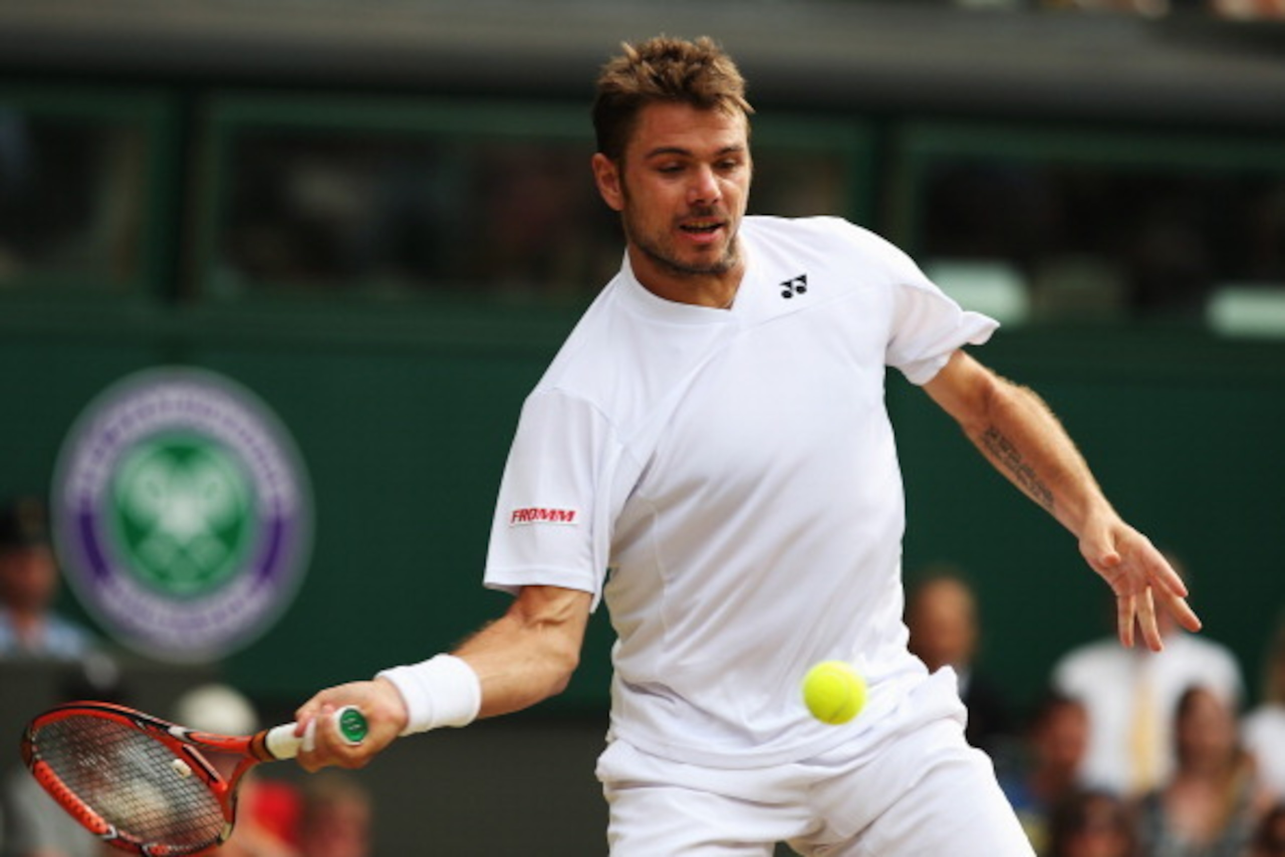 LONDON, ENGLAND - JULY 02:  Stan Wawrinka of Switzerland during his Gentlemen's Singles quarter-final match against Roger Federer of Switzerland on day nine of the Wimbledon Lawn Tennis Championships at the All England Lawn Tennis and Croquet Club  at Wim