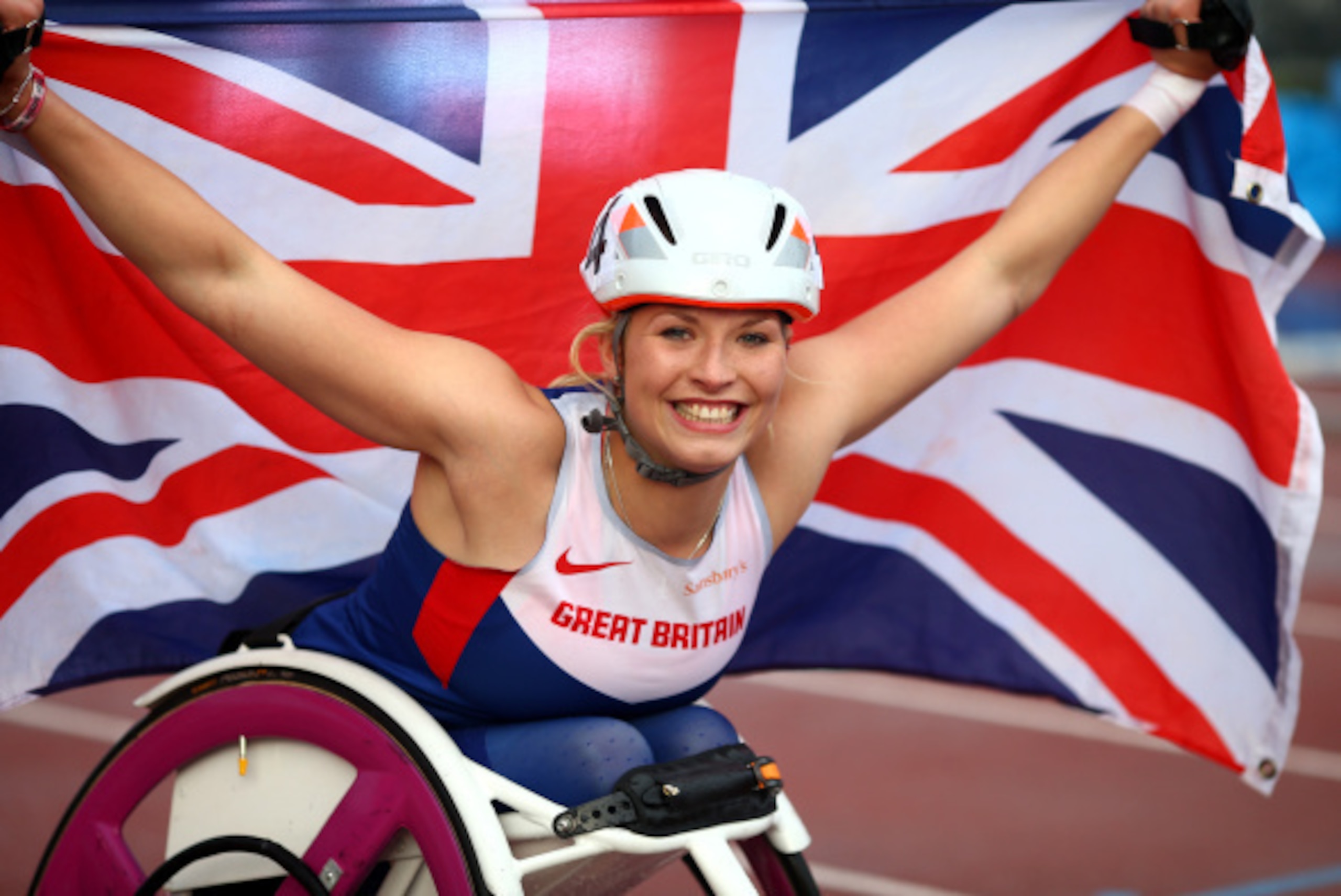 SWANSEA, WALES - AUGUST 21: Samantha Kinghorn of Great Britain celebrates after winning the womens 800M T53 final and her third gold medal during day three of the IPC Athletics European Championships at Swansea University Sports Village on August 21, 2014