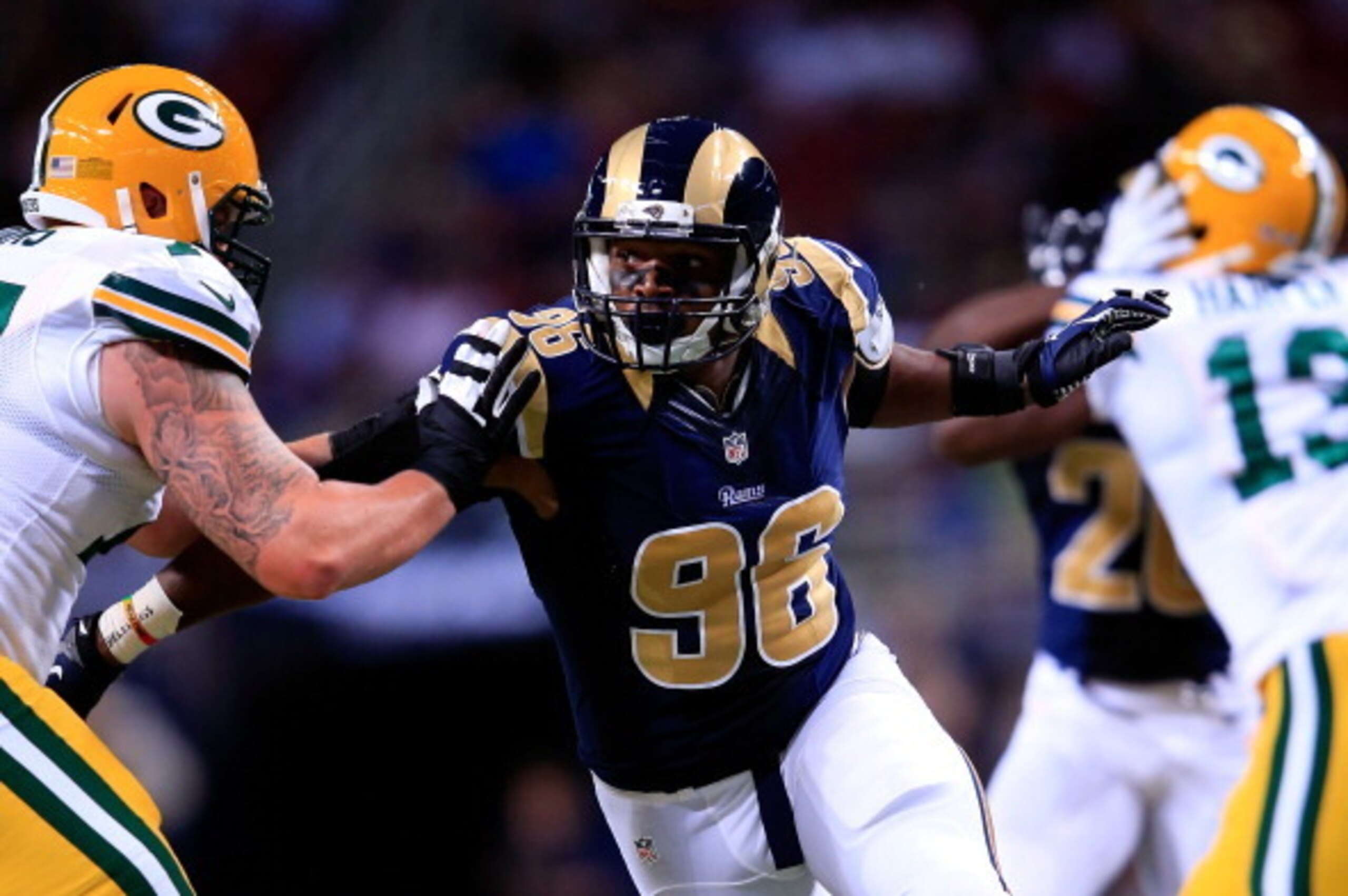 ST LOUIS, MO - AUGUST 16: Defensive end Michael Sam #96 of the St. Louis Rams in action during the preseason game against the Green Bay Packers at Edward Jones Dome on August 16, 2014 in St Louis, Missouri. (Photo by Jamie Squire/Getty Images) ST LOUIS, MO - AUGUST 16: Defensive end Michael Sam #96 of the St. Louis Rams in action during the preseason game against the Green Bay Packers at Edward Jones Dome on August 16, 2014 in St Louis, Missouri. (Photo by Jamie Squire/Getty Images)
