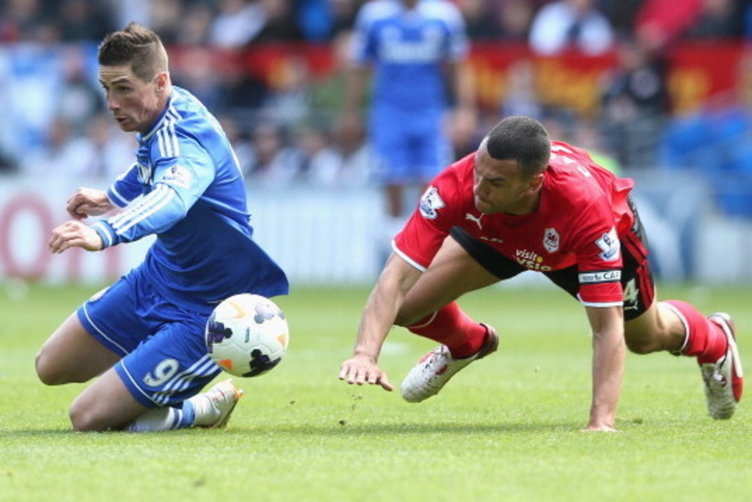CARDIFF, WALES - MAY 11: Fernando Torres of Chelsea is challenged by Steven Caulker (R) during the Barclays Premier League match between Cardiff City and Chelsea at the Cardiff City Stadium on May 11, 2014 in Cardiff, Wales. (Photo by David Rogers/Getty CARDIFF, WALES - MAY 11: Fernando Torres of Chelsea is challenged by Steven Caulker (R) during the Barclays Premier League match between Cardiff City and Chelsea at the Cardiff City Stadium on May 11, 2014 in Cardiff, Wales. (Photo by David Rogers/Getty