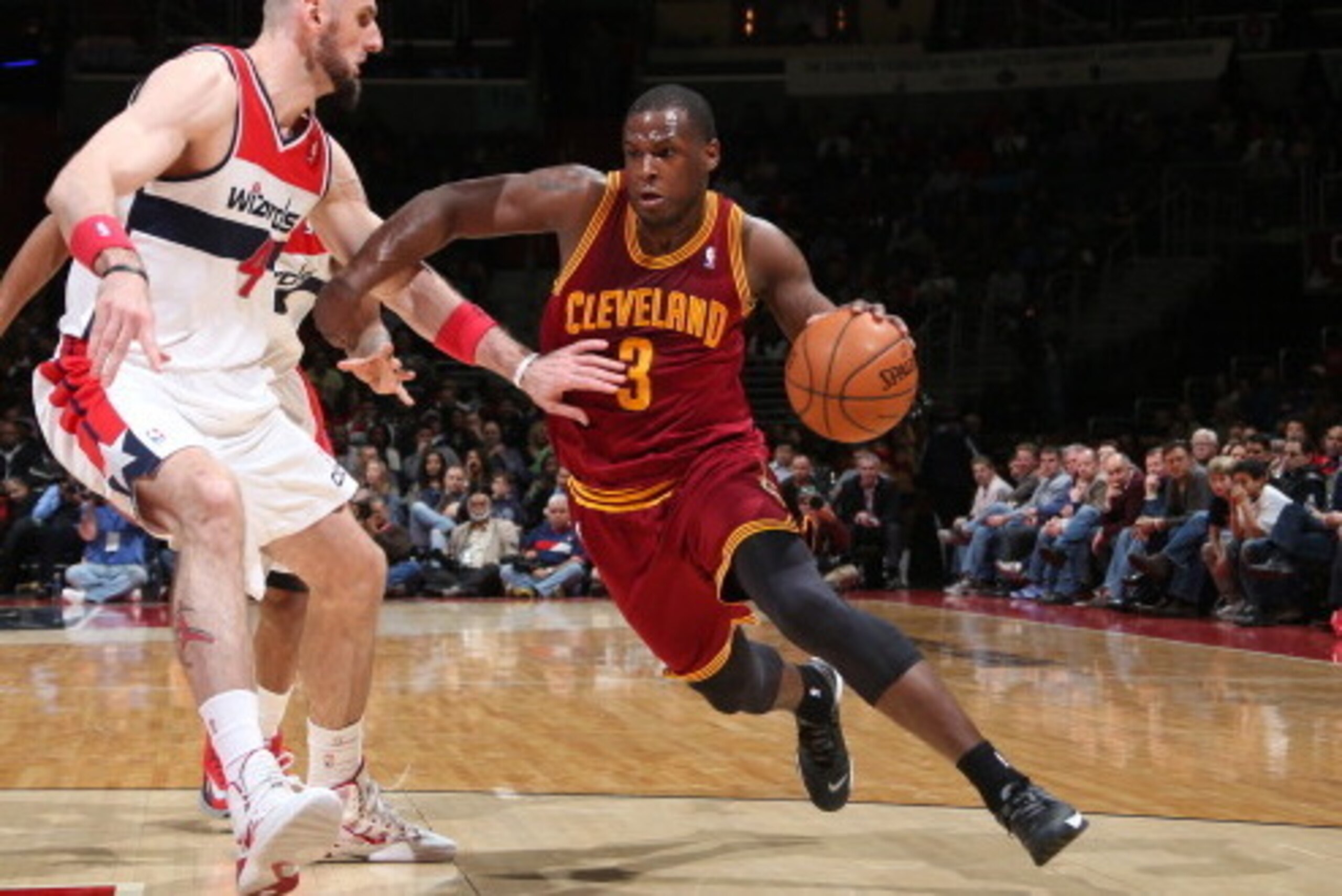 WASHINGTON, DC - FEBRUARY 7: Dion Waiters #3 of the Cleveland Cavaliers drives against Marcin Gortat #4 of the Washington Wizards during the game at the Verizon Center on February 7, 2014 in Washington, DC. NOTE TO USER: User expressly acknowledges and ag