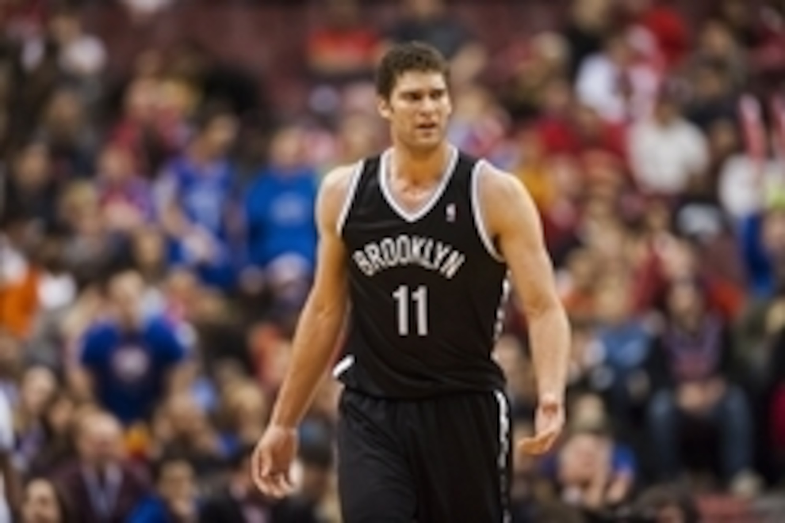 Dec 20, 2013; Philadelphia, PA, USA; Brooklyn Nets center Brook Lopez (11) during the fourth quarter against the Philadelphia 76ers at the Wells Fargo Center. The Sixers defeated the Nets 121-120 in overtime. Mandatory Credit: Howard Smith-USA TODAY Sport