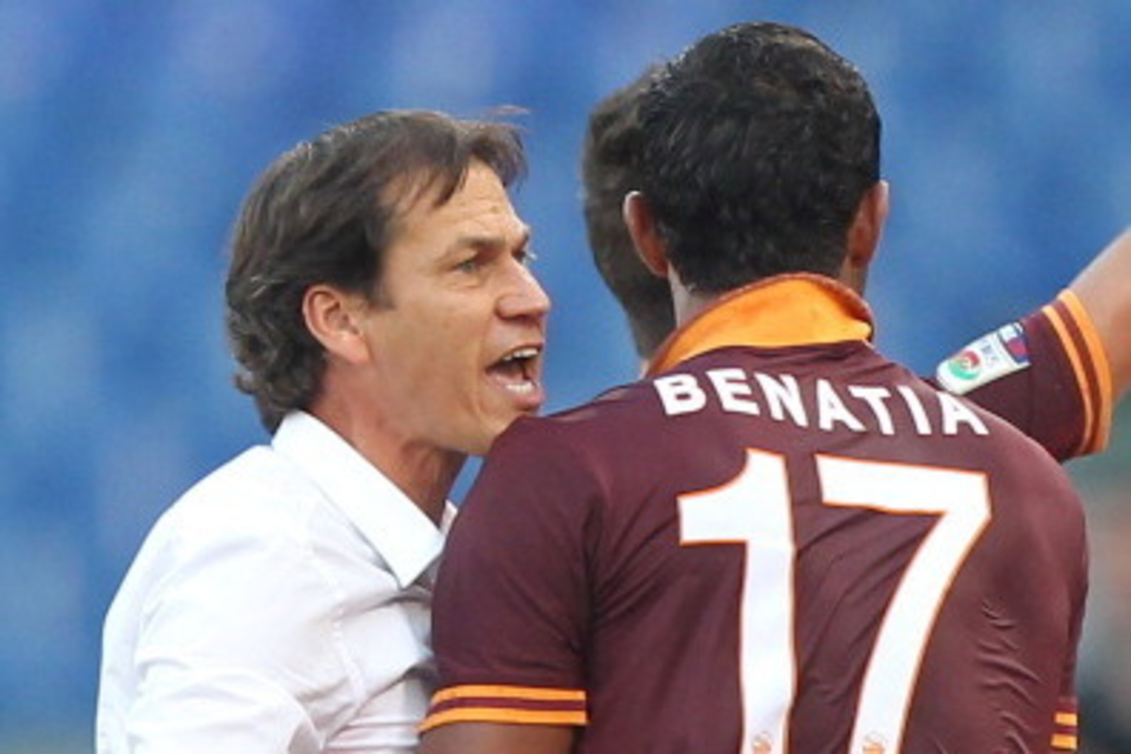 ROME, ITALY - SEPTEMBER 01:  AS Roma head coach Rudi Garcia (L) celebrates with Mehdi Benatia after their team's second goal scored by Miralem Pjanic during the Serie A match between AS Roma and Hellas Verona FC at Stadio Olimpico at Stadio Olimpico on Se