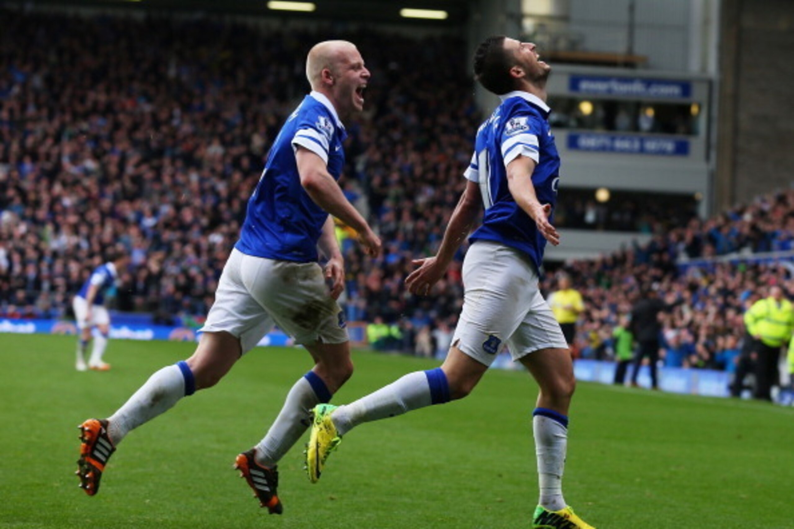 LIVERPOOL, ENGLAND - APRIL 06:  Kevin Mirallas of Everton (R)  celebrates scoring the third goal during the Barclays Premier League match between Everton and Arsenal at Goodison Park on April 6, 2014 in Liverpool, England.  (Photo by Alex Livesey/Getty Im