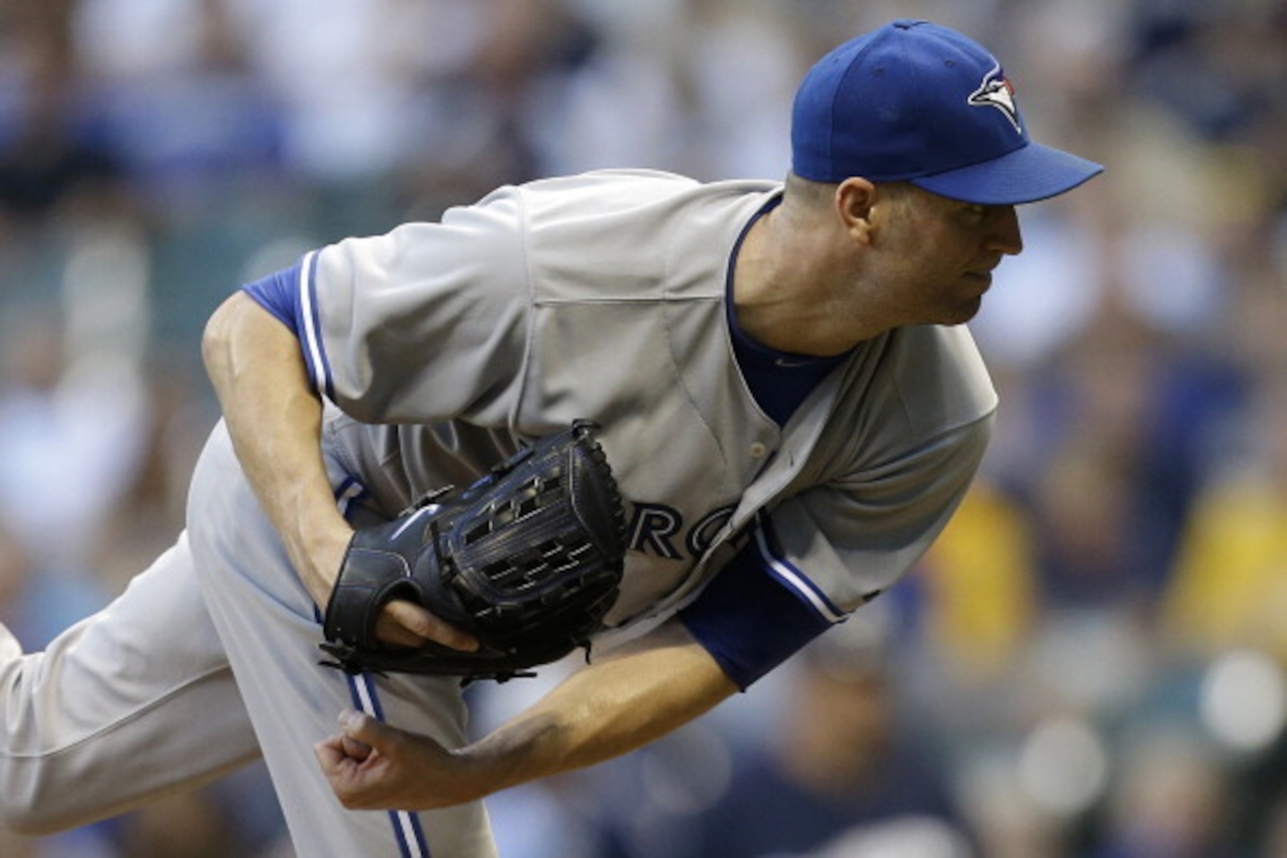 MILWAUKEE, WI - AUGUST 19: J.A. Happ #48 of the Toronto Blue Jays pitches during the first inning against the Milwaukee Brewers during the Interleague game at Miller Park on August 19, 2014 in Milwaukee, Wisconsin. (Photo by Mike McGinnis/Getty Images)