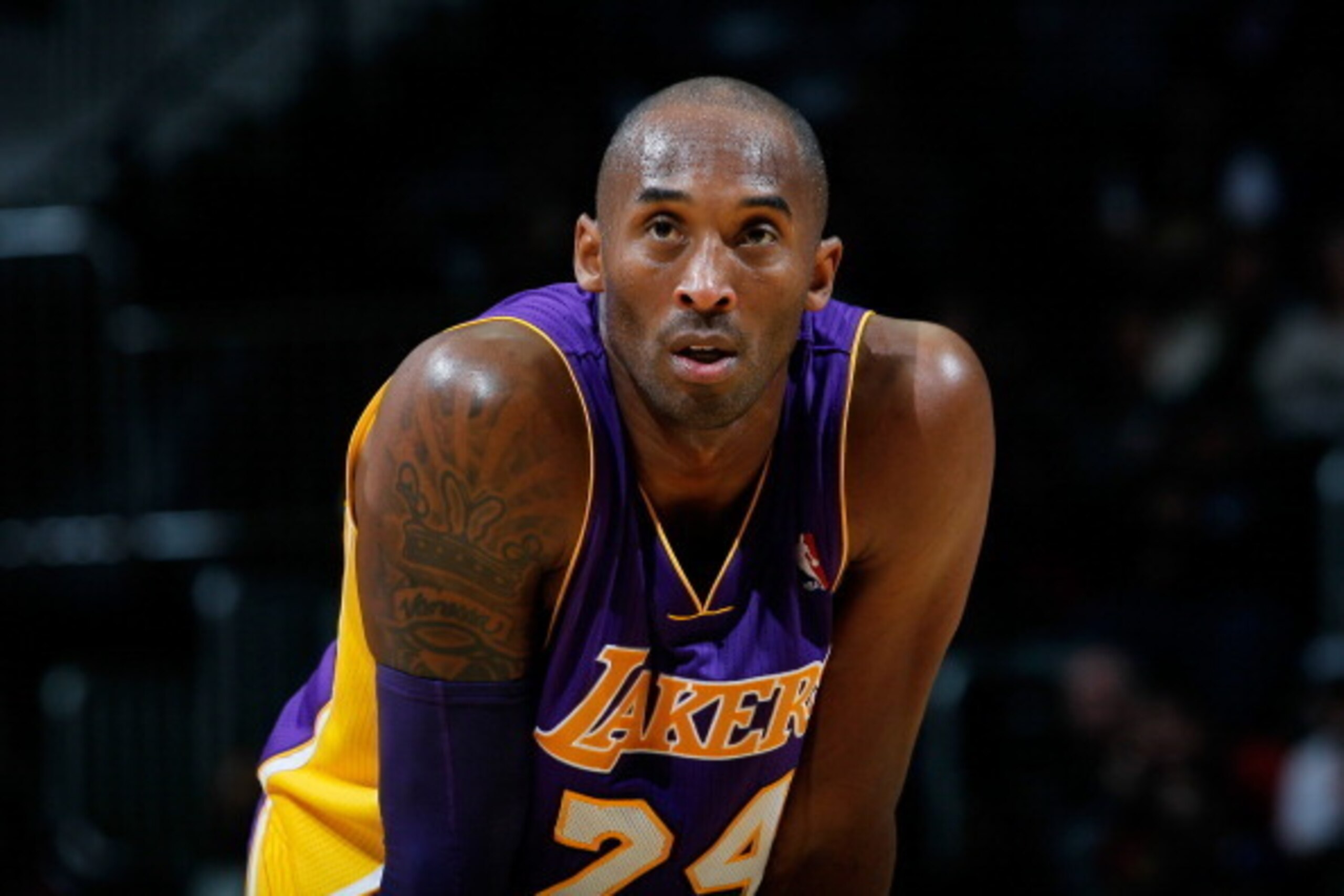 ATLANTA, GA - DECEMBER 16: Kobe Bryant #24 of the Los Angeles Lakers stands during a free throw against the Atlanta Hawks at Philips Arena on December 16, 2013 in Atlanta, Georgia. NOTE TO USER: User expressly acknowledges and agrees that, by downloadin ATLANTA, GA - DECEMBER 16: Kobe Bryant #24 of the Los Angeles Lakers stands during a free throw against the Atlanta Hawks at Philips Arena on December 16, 2013 in Atlanta, Georgia. NOTE TO USER: User expressly acknowledges and agrees that, by downloadin