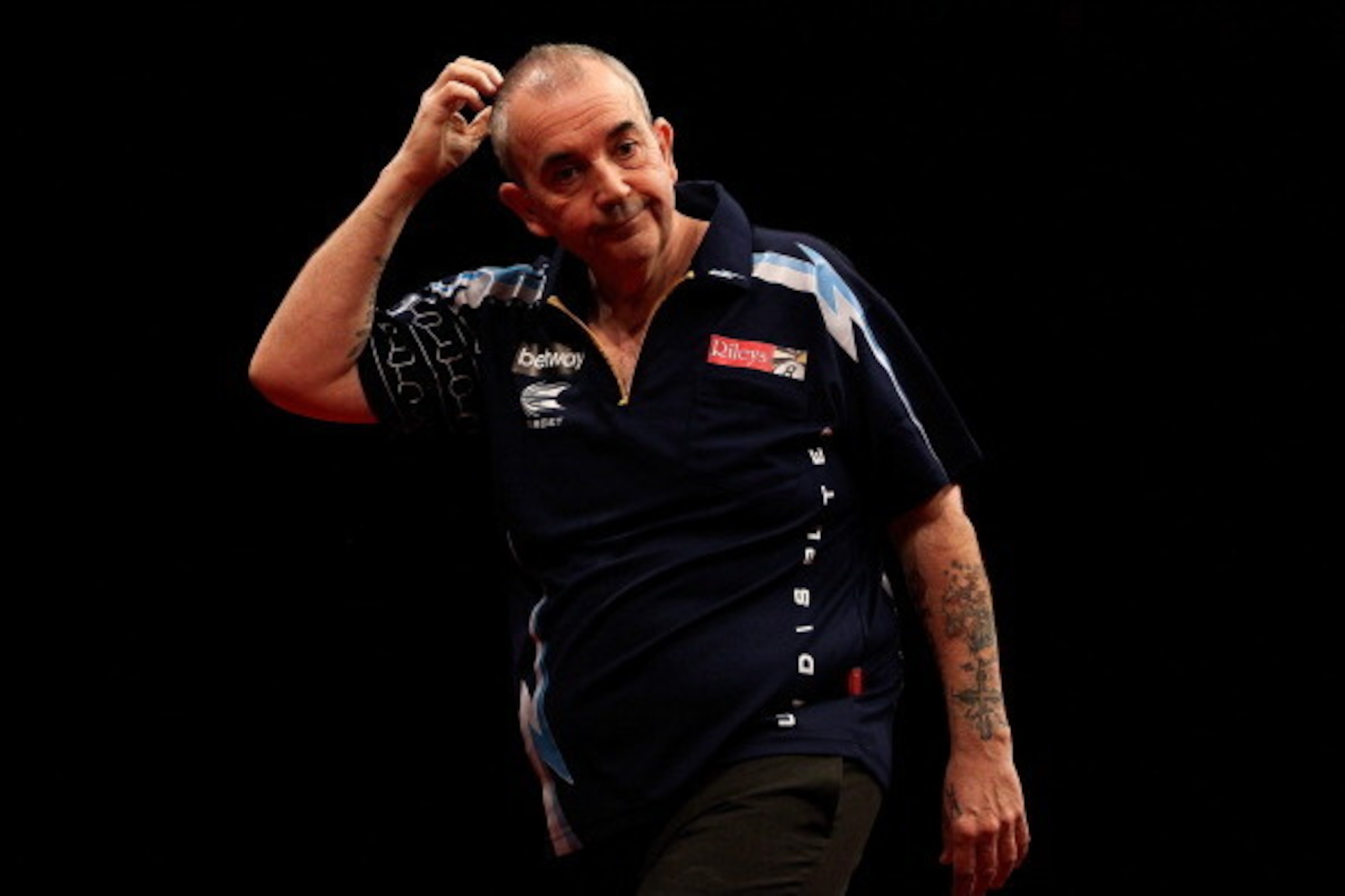 LONDON, ENGLAND - MAY 22:  Phil Taylor of England reacts during the McCoys Premier League Darts Play-Offs Semi Final match between Raymond van Barneveld and Phil Taylor at O2 Arena on May 22, 2014 in London, England.  (Photo by Ben Hoskins/Getty Images)