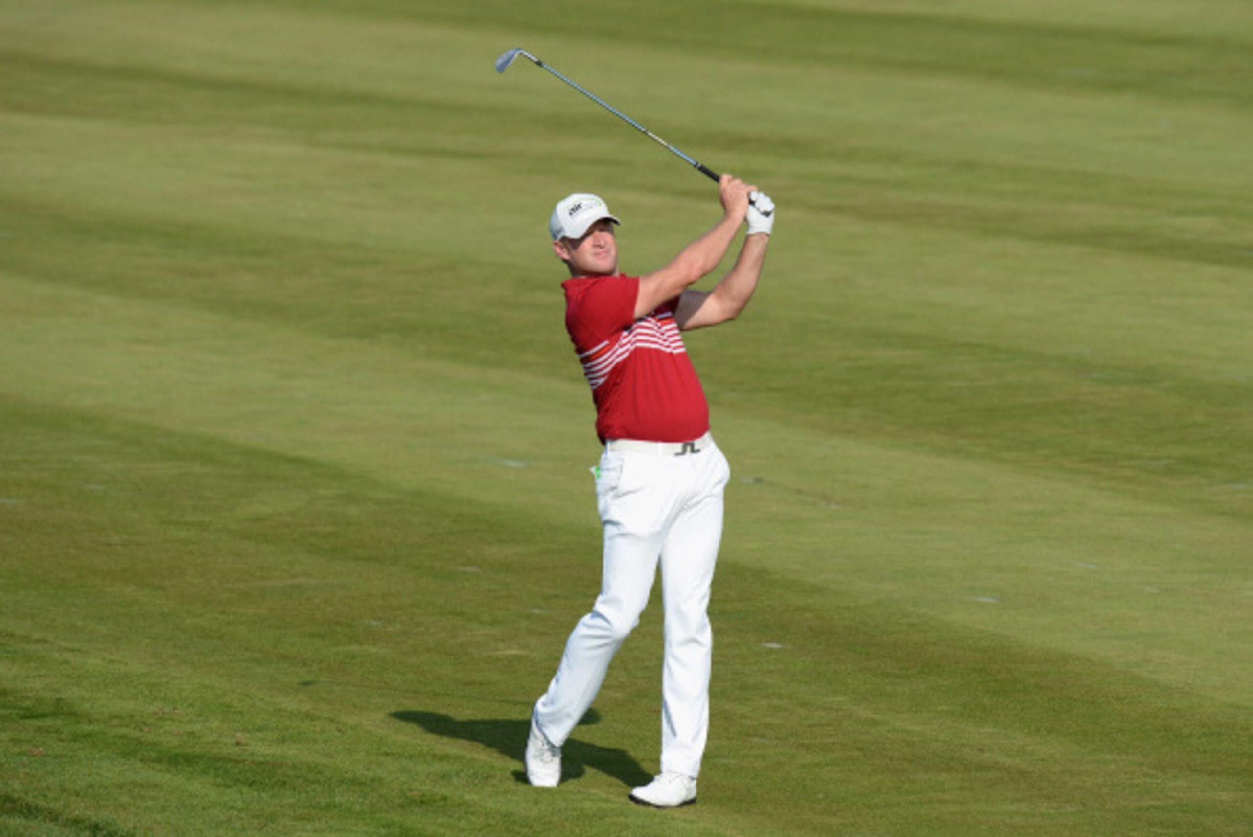 PRAGUE, CZECH REPUBLIC - AUGUST 22:  Jamie Donaldson of Wales plays his second shot on the 14th fairway during day two of D+D REAL Czech Masters at Albatross Golf Resort on August 22, 2014 in Prague, Czech Republic.  (Photo by Tony Marshall/Getty Images)