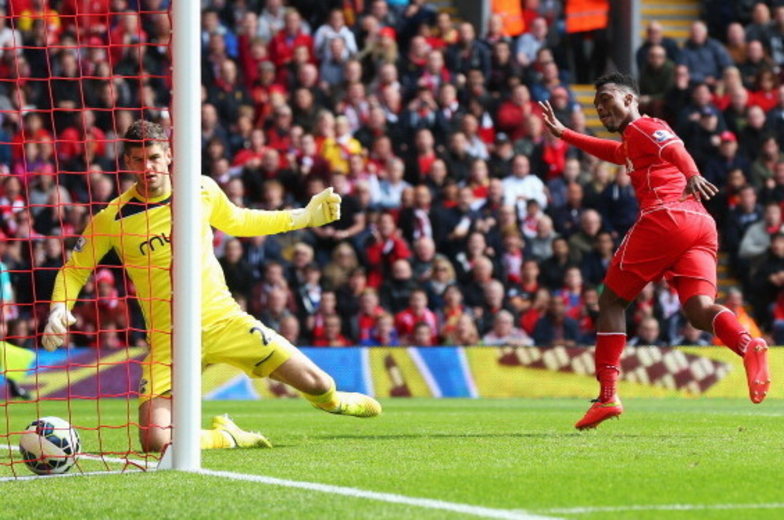 LIVERPOOL, ENGLAND - AUGUST 17:  Daniel Sturridge of Liverpool scores his goal during the Barclays Premier League match between Liverpool and Southampton at Anfield on August 17, 2014 in Liverpool, England.  (Photo by Alex Livesey/Getty Images)