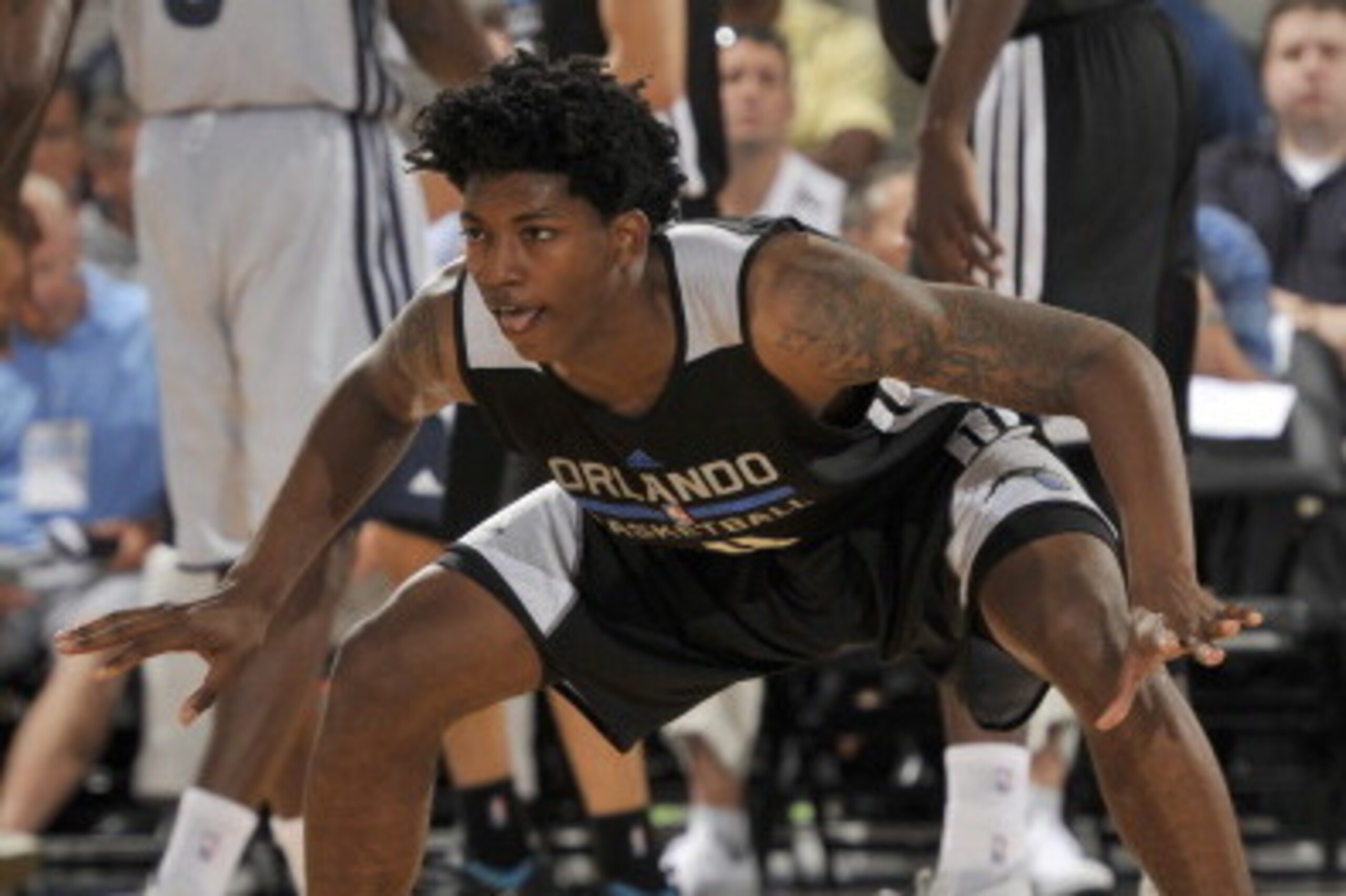 ORLANDO, FL - JULY 8: Elfrid Payton #4 of the Orlando Magic defends against the Memphis Grizzlies during the game during the Samsung NBA Summer League 2014 on July 8, 2014 at Amway Center in Orlando, Florida. NOTE TO USER: User expressly acknowledges and 