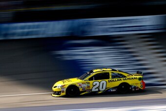 BROOKLYN, MI - AUGUST 15: Matt Kenseth, driver of the #20 Dollar General Toyota, on track during qualifying for the NASCAR Sprint Cup Series Pure Michigan 400 at Michigan International Speedway on August 15, 2014 in Brooklyn, Michigan.  (Photo by Gregory 