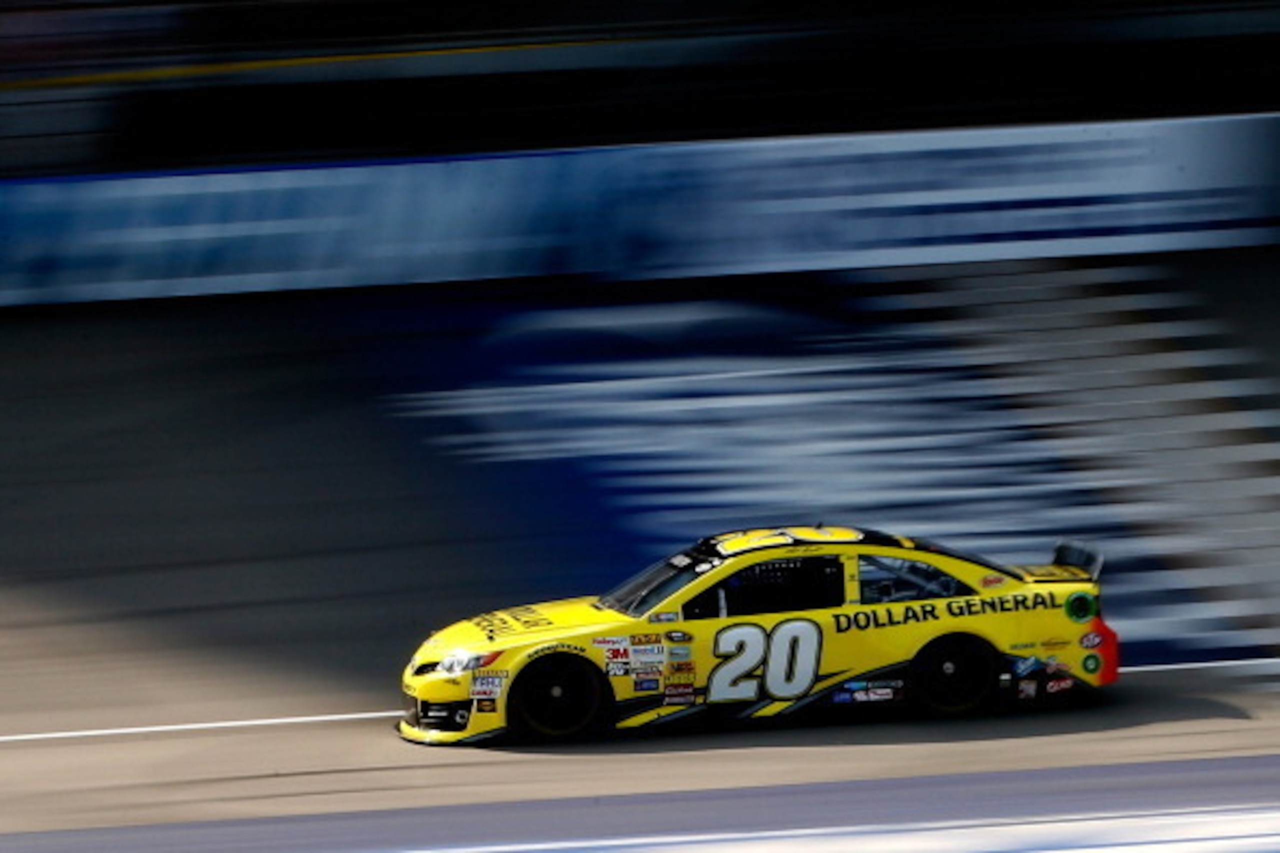 BROOKLYN, MI - AUGUST 15: Matt Kenseth, driver of the #20 Dollar General Toyota, on track during qualifying for the NASCAR Sprint Cup Series Pure Michigan 400 at Michigan International Speedway on August 15, 2014 in Brooklyn, Michigan.  (Photo by Gregory 