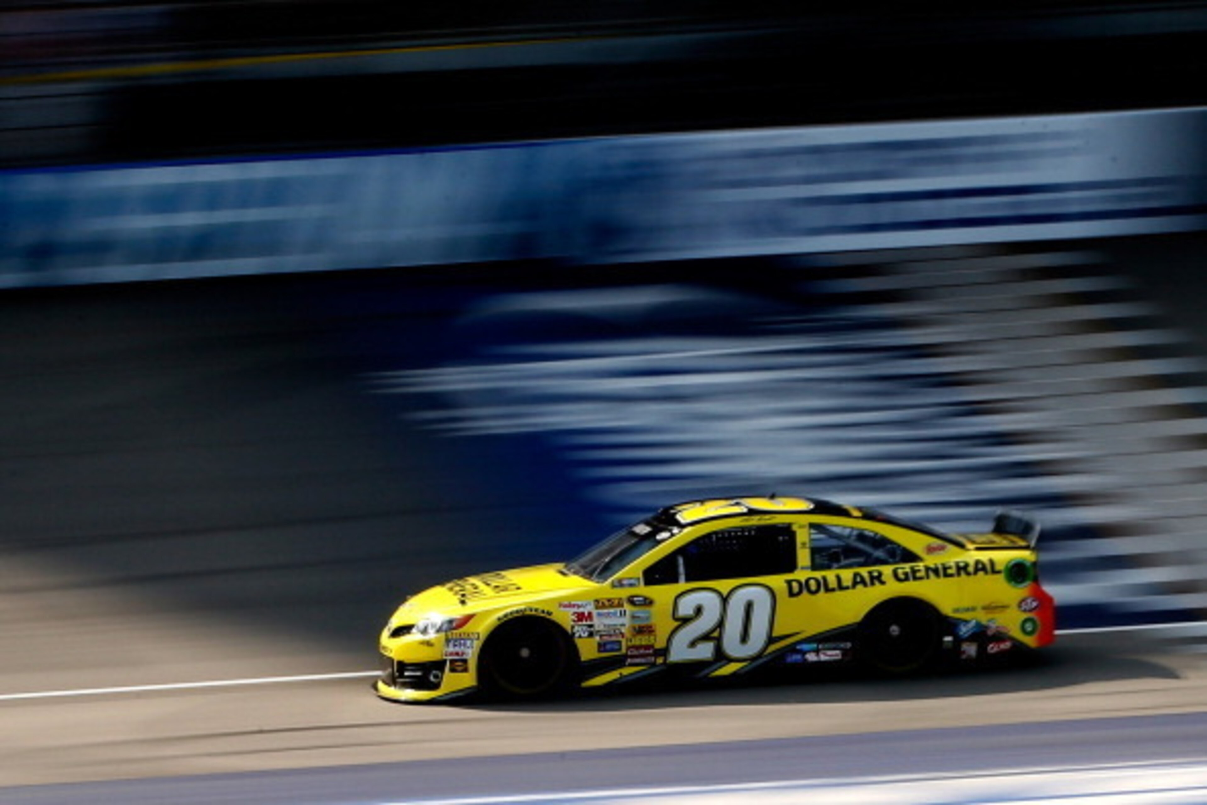 BROOKLYN, MI - AUGUST 15: Matt Kenseth, driver of the #20 Dollar General Toyota, on track during qualifying for the NASCAR Sprint Cup Series Pure Michigan 400 at Michigan International Speedway on August 15, 2014 in Brooklyn, Michigan.  (Photo by Gregory 