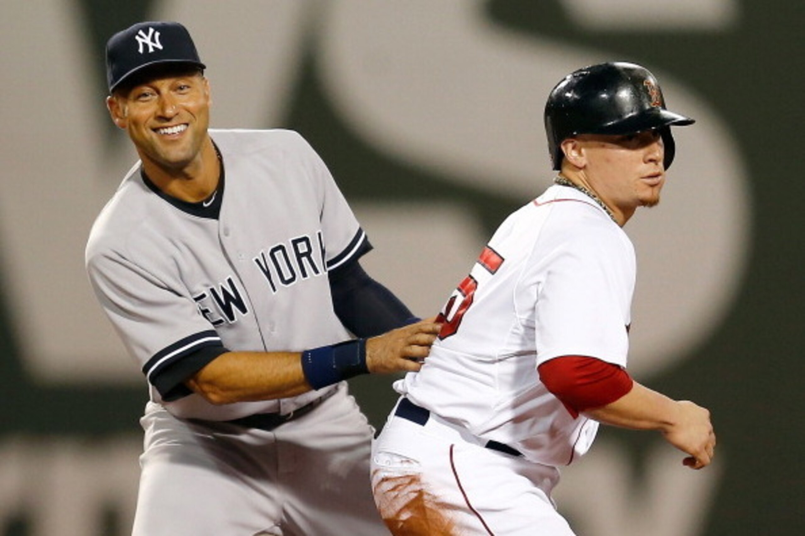 BOSTON, MA - AUGUST 3: Derek Jeter #2 of the New York Yankees smiles after making the out on Christian Vazquez #55 of the Boston Red Sox in the second inning at Fenway Park on August 3, 2014 in Boston, Massachusetts. (Photo by Jim Rogash/Getty Images) BOSTON, MA - AUGUST 3: Derek Jeter #2 of the New York Yankees smiles after making the out on Christian Vazquez #55 of the Boston Red Sox in the second inning at Fenway Park on August 3, 2014 in Boston, Massachusetts. (Photo by Jim Rogash/Getty Images)