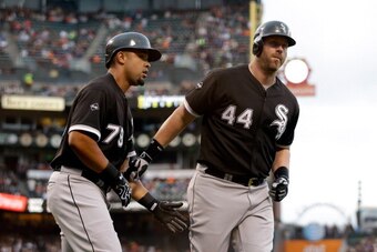 SAN FRANCISCO, CA - AUGUST 12:  Adam Dunn #44 of the Chicago White Sox is congratulated by Jose Abreu #79 after he hit a two-run home run in the first inning against the San Francisco Giants at AT&T Park on August 12, 2014 in San Francisco, California.  (