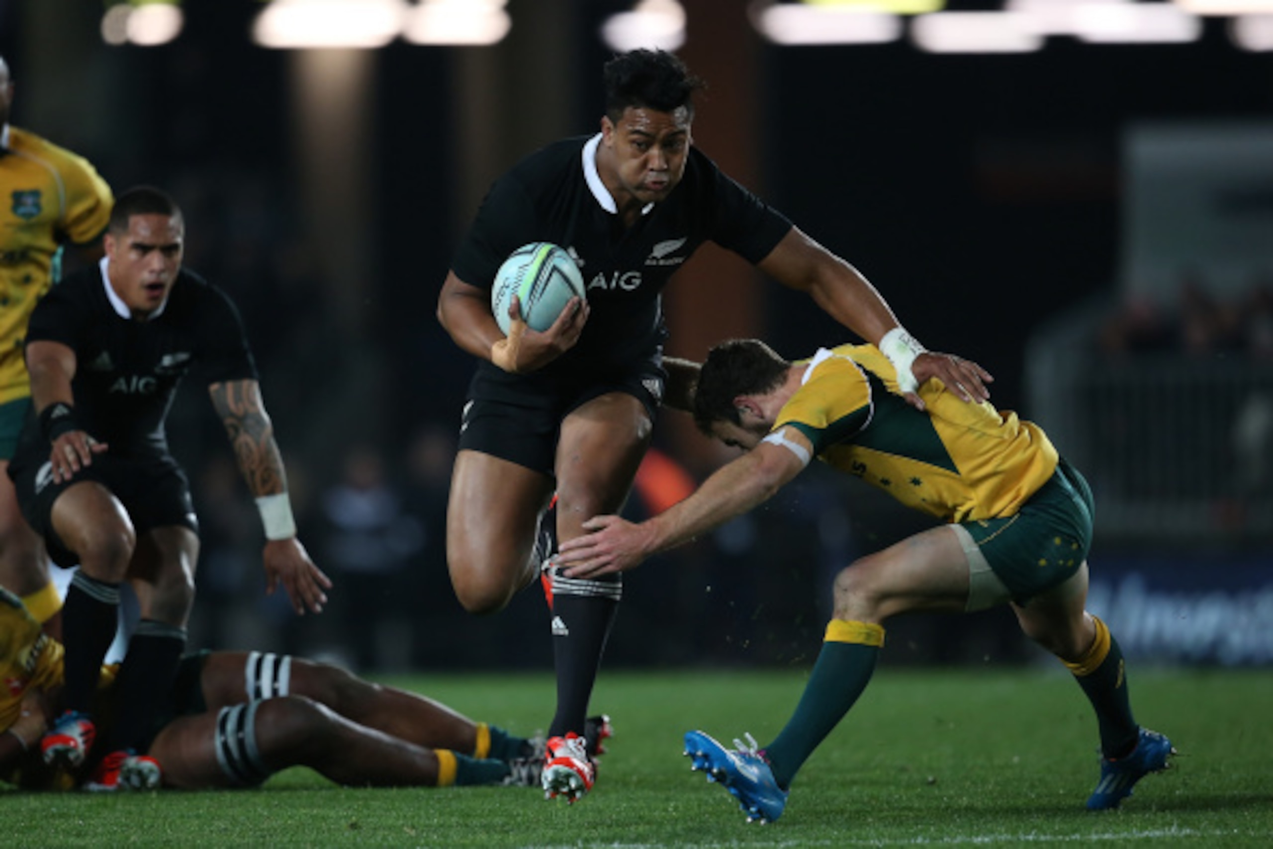AUCKLAND, NEW ZEALAND - AUGUST 23:  Julian Savea of the All Blacks makes a break during The Rugby Championship match between the New Zealand All Blacks and the Australian Wallabies at Eden Park on August 23, 2014 in Auckland, New Zealand.  (Photo by Marti