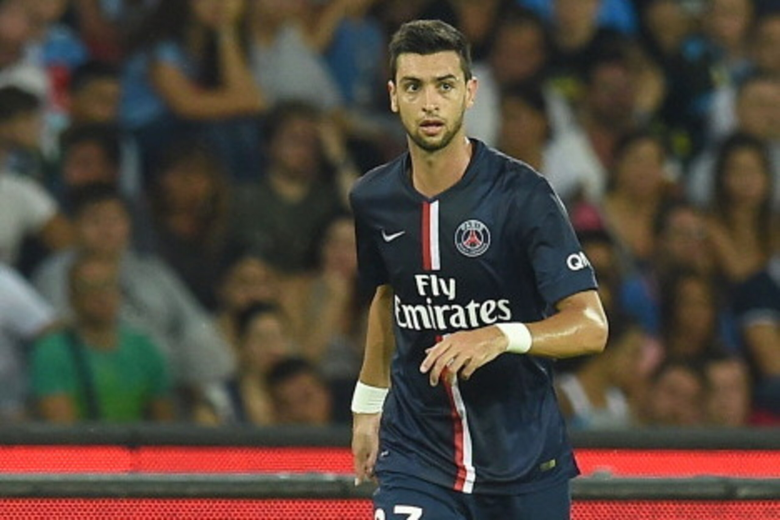 NAPLES, ITALY - AUGUST 11: Javier Pastore of Paris Saint Germain in action during the pre-season friendly match between SSC Napoli and Paris Saint-Germain FC at Stadio San Paolo on August 11, 2014 in Naples, Italy.  (Photo by Giuseppe Bellini/Getty Images