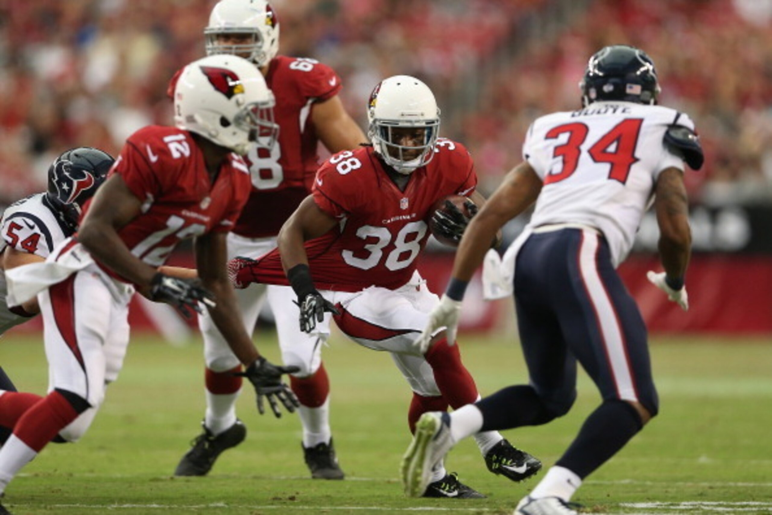 GLENDALE, AZ - AUGUST 09:  Running back Andre Ellington #38 of the Arizona Cardinals rushes the football against the Houston Texans during the preseason NFL game at the University of Phoenix Stadium on August 9, 2014 in Glendale, Arizona. The Cardinals de