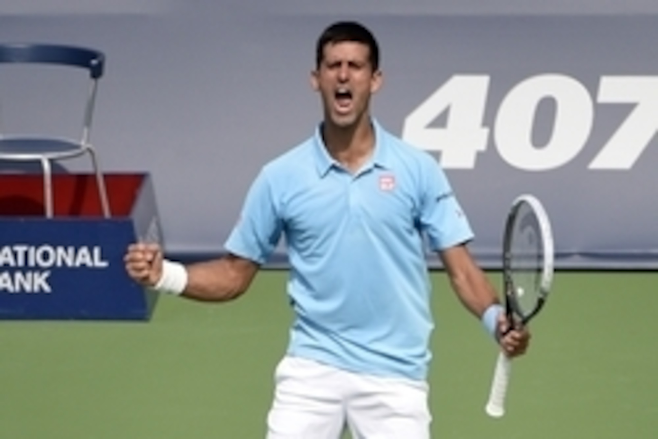 Aug 6, 2014; Toronto, Ontario, Canada; Novak Djokovic (SRB) reacts to winning against Gael Monfils (FRA)  on day three of the Rogers Cup tennis tournament at Rexall Centre. Djokovic won 6-2 6-7 7-6. Mandatory Credit: Peter Llewellyn-USA TODAY Sports