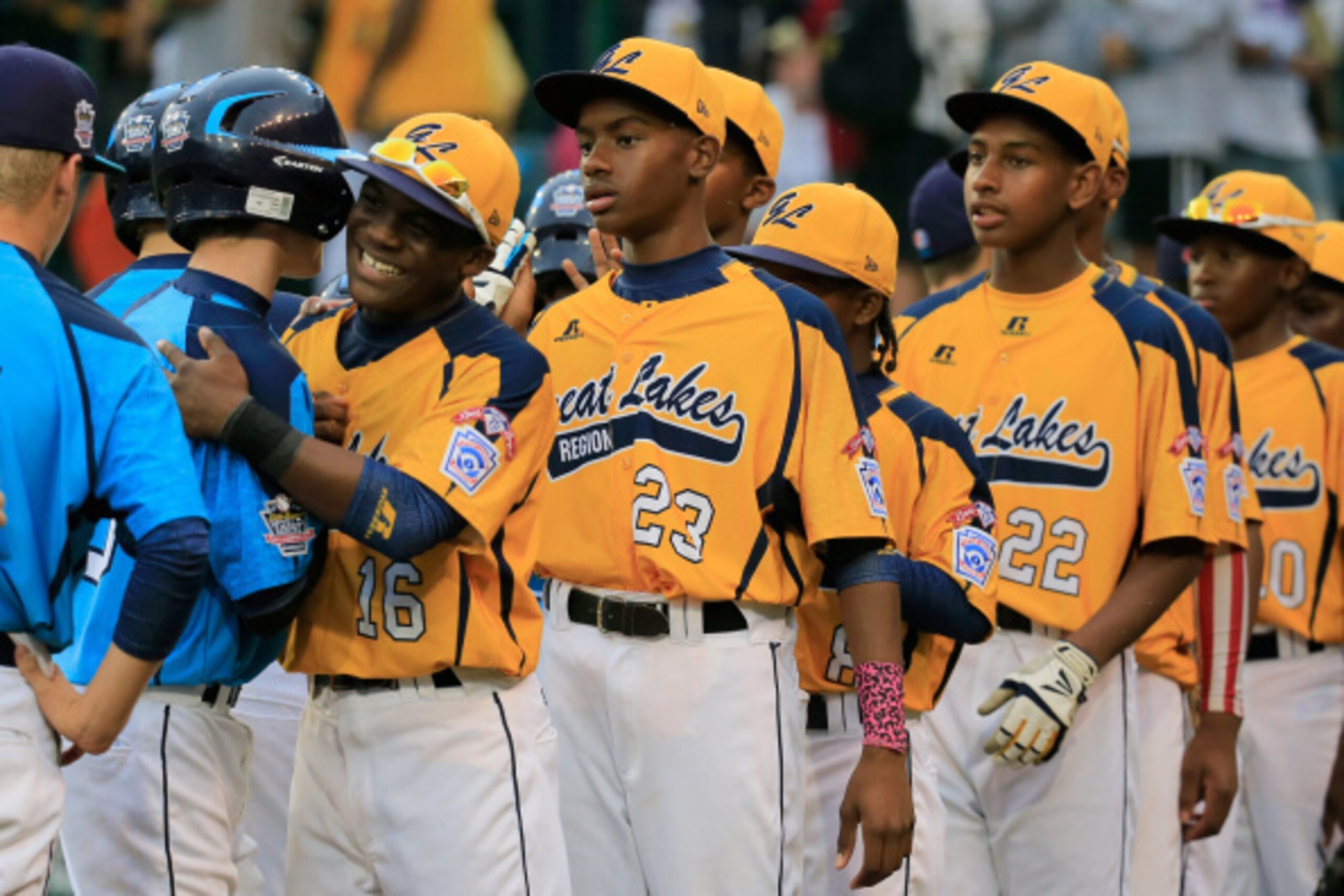 SOUTH WILLIAMSPORT, PA - AUGUST 23:  Members of the Great Lakes Team from Chicago, Illinois shakes hands with members of the West Team from Las Vegas, Nevada following their 7-5 win during the United States Championship game of the Little League World Ser