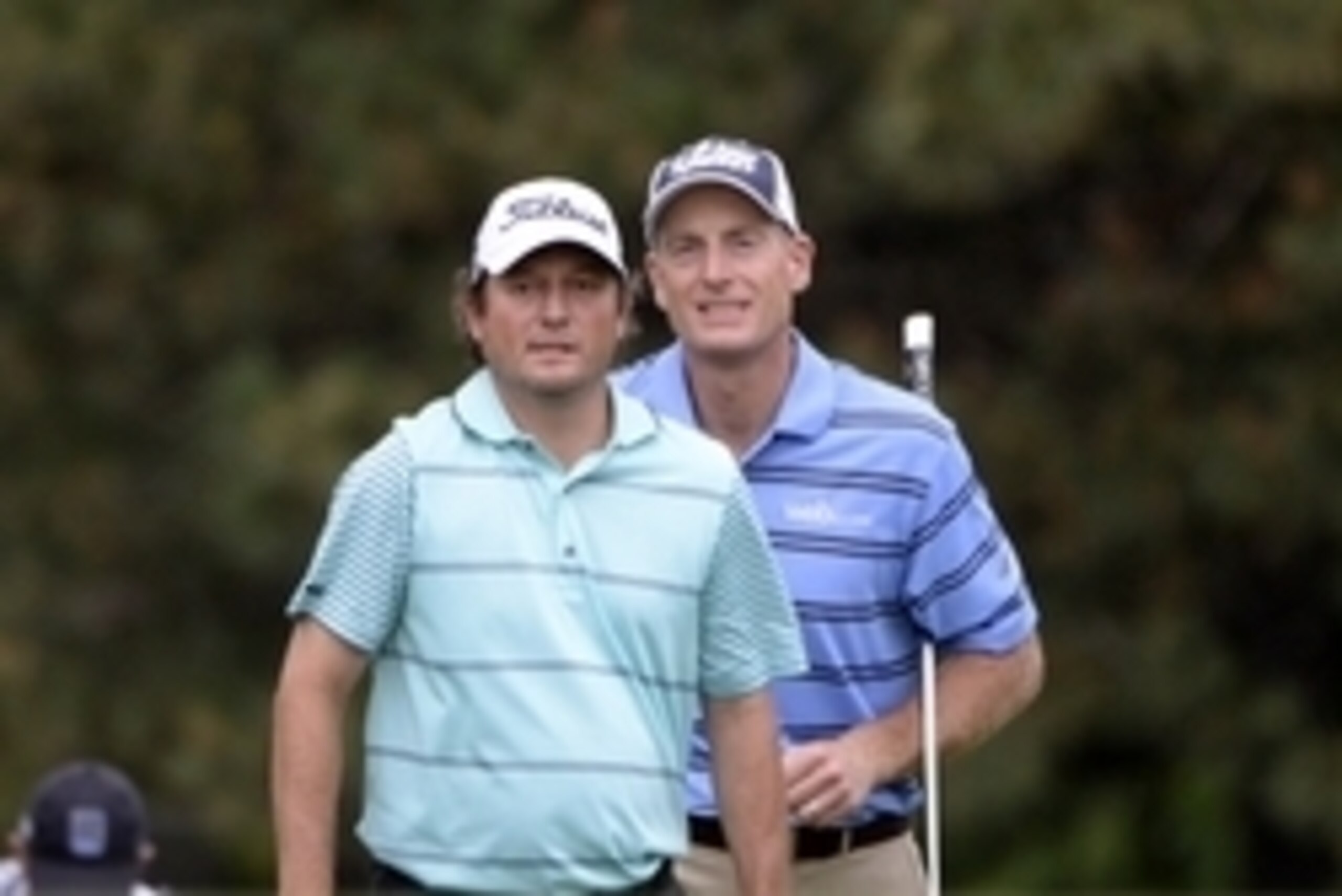 Jul 27, 2014; Ile Bizard, Quebec, CAN; Tim Clark (L) and Jim Furyk (R) come up to the 18th green during the Final round of the RBC Canadian Open at Royal Montreal GC - Blue Course. Mandatory Credit: Eric Bolte-USA TODAY Sports